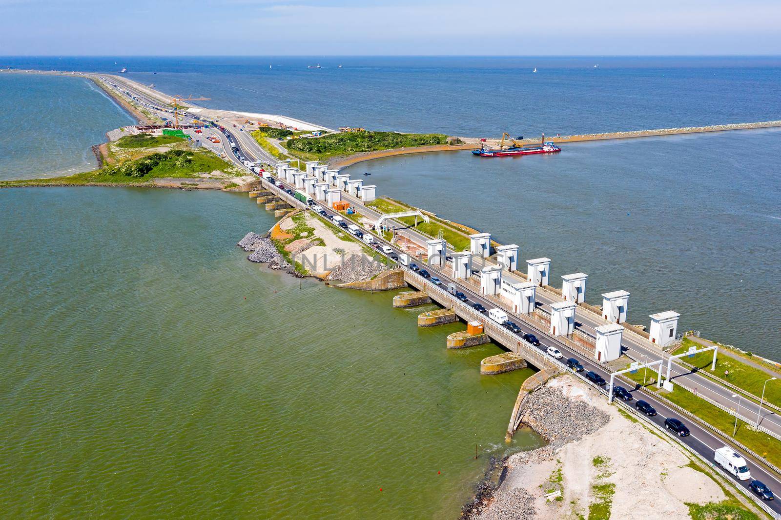 Aerial from sluices at Kornwerderzand on the Afsluitdijk in the Netherlands by devy