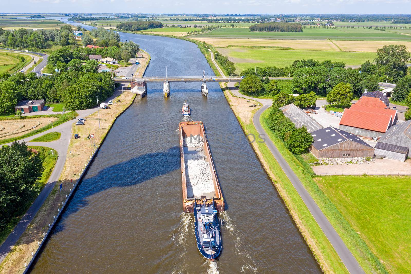 Aerial from towboat and pusher from freight on Princes Margriet canal in Friesland the Netherlands by devy