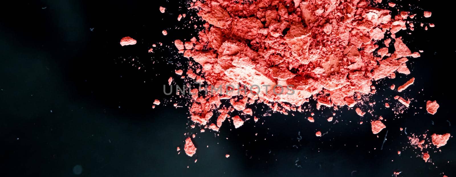 Crushed cosmetics, mineral organic eyeshadow, blush and cosmetic powder isolated on black background, makeup and beauty banner, flatlay design by Anneleven