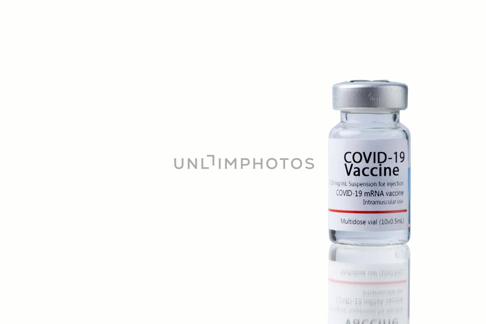 COVID-19 VACCINE ampoule isolated on a white background. by thanumporn