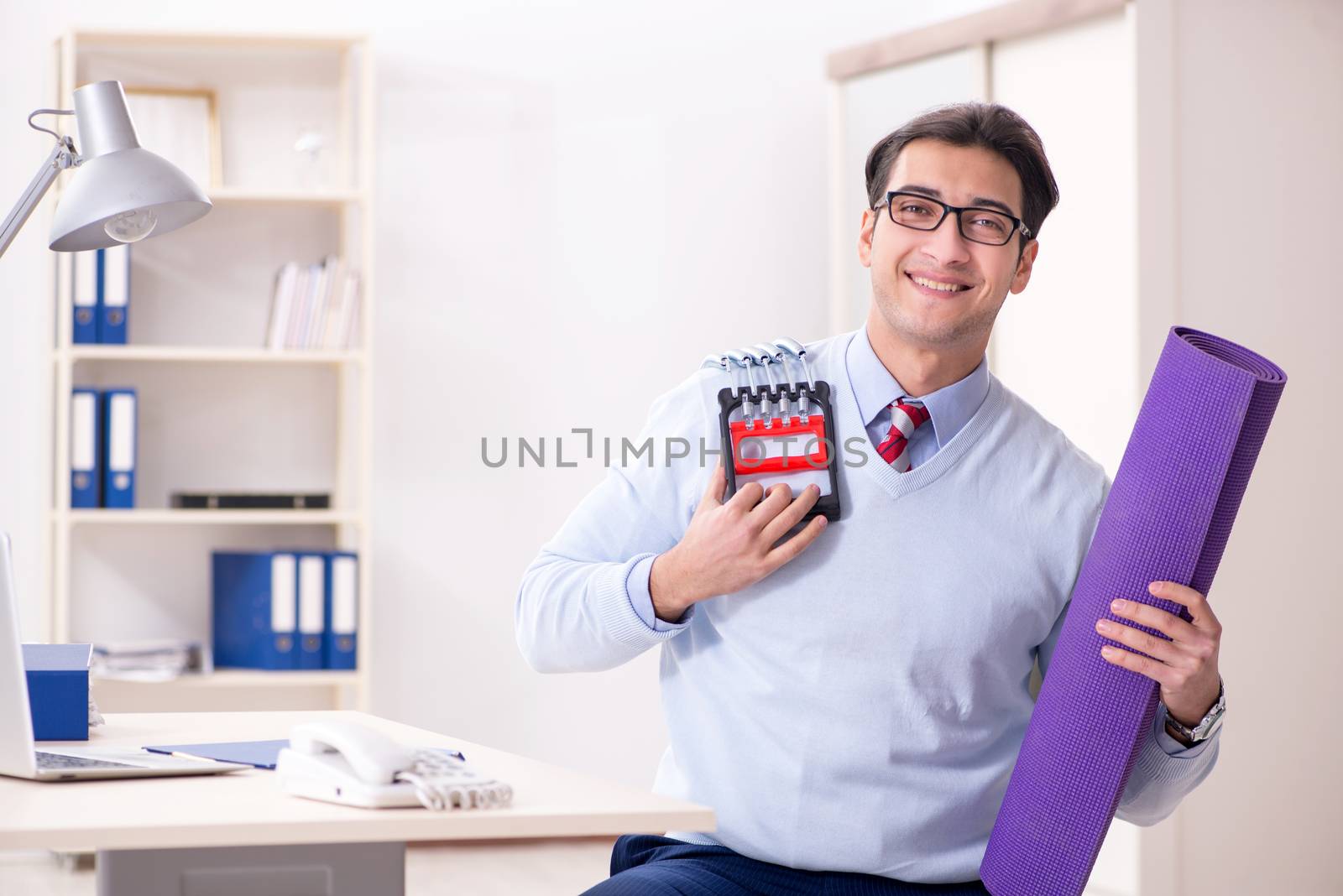 Businessman rushing to gym during lunch break