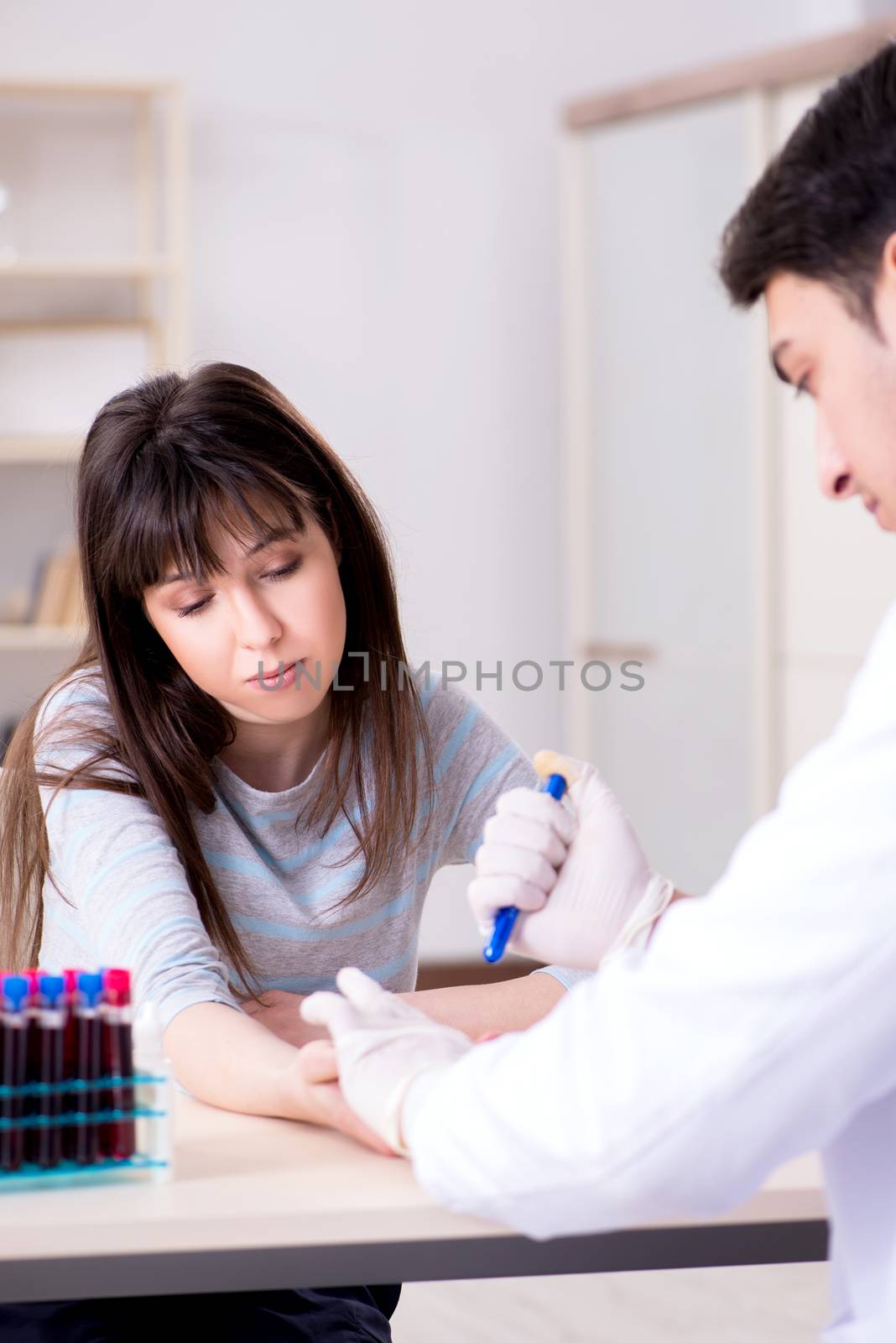 Patient during blood test sampling procedure taken for analysis