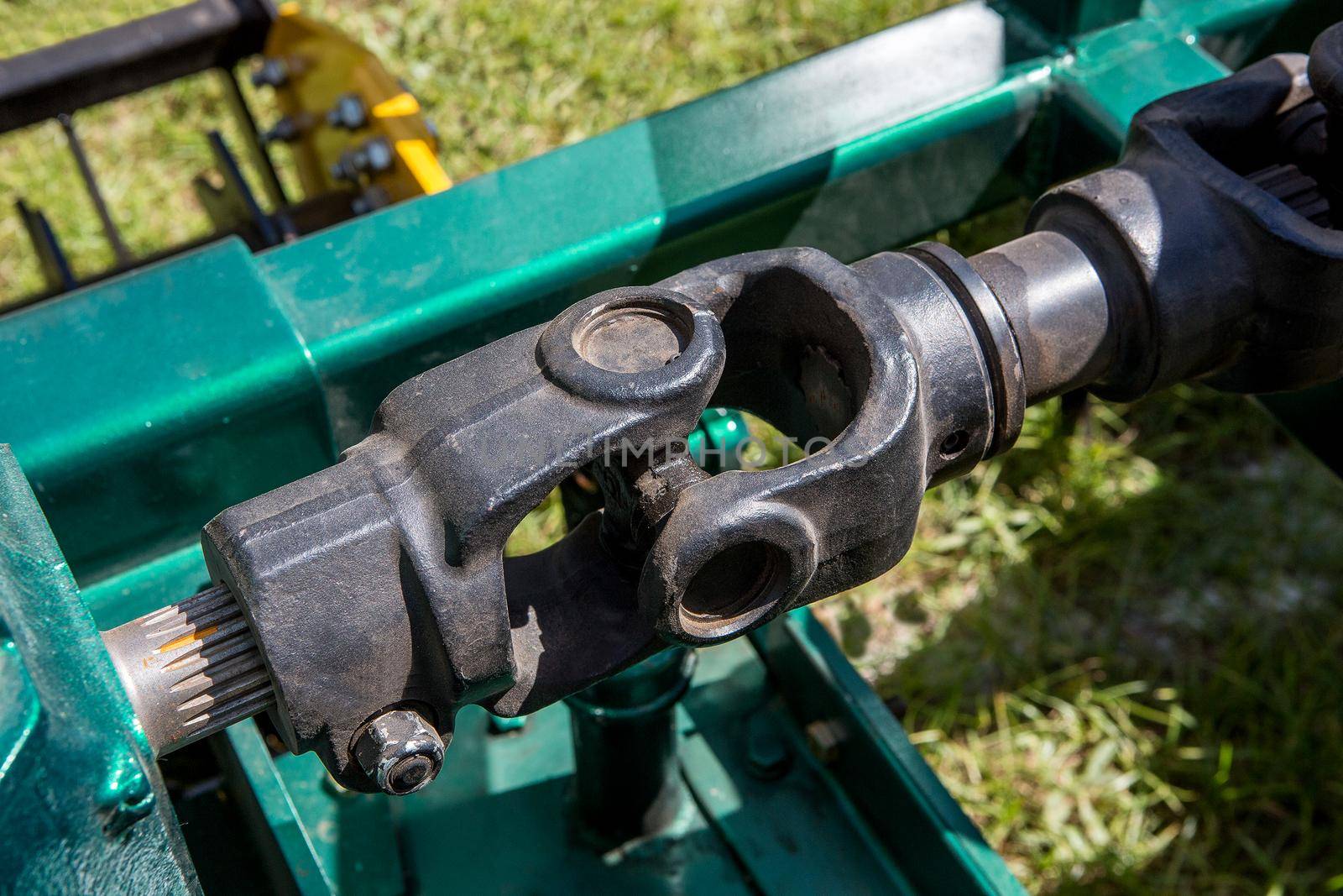 Modern tractor on modern agricultural machinery.