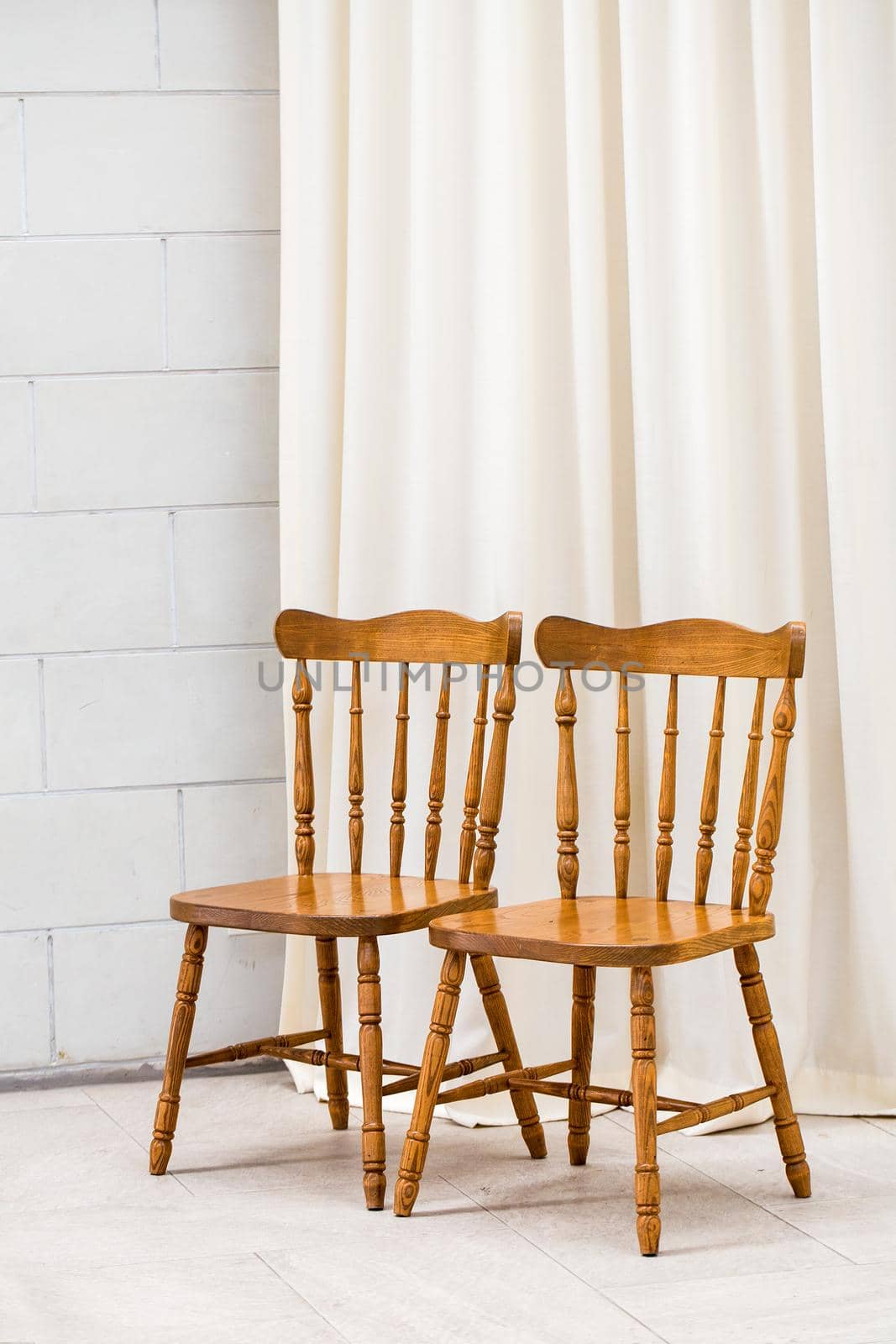 Two chair White wall