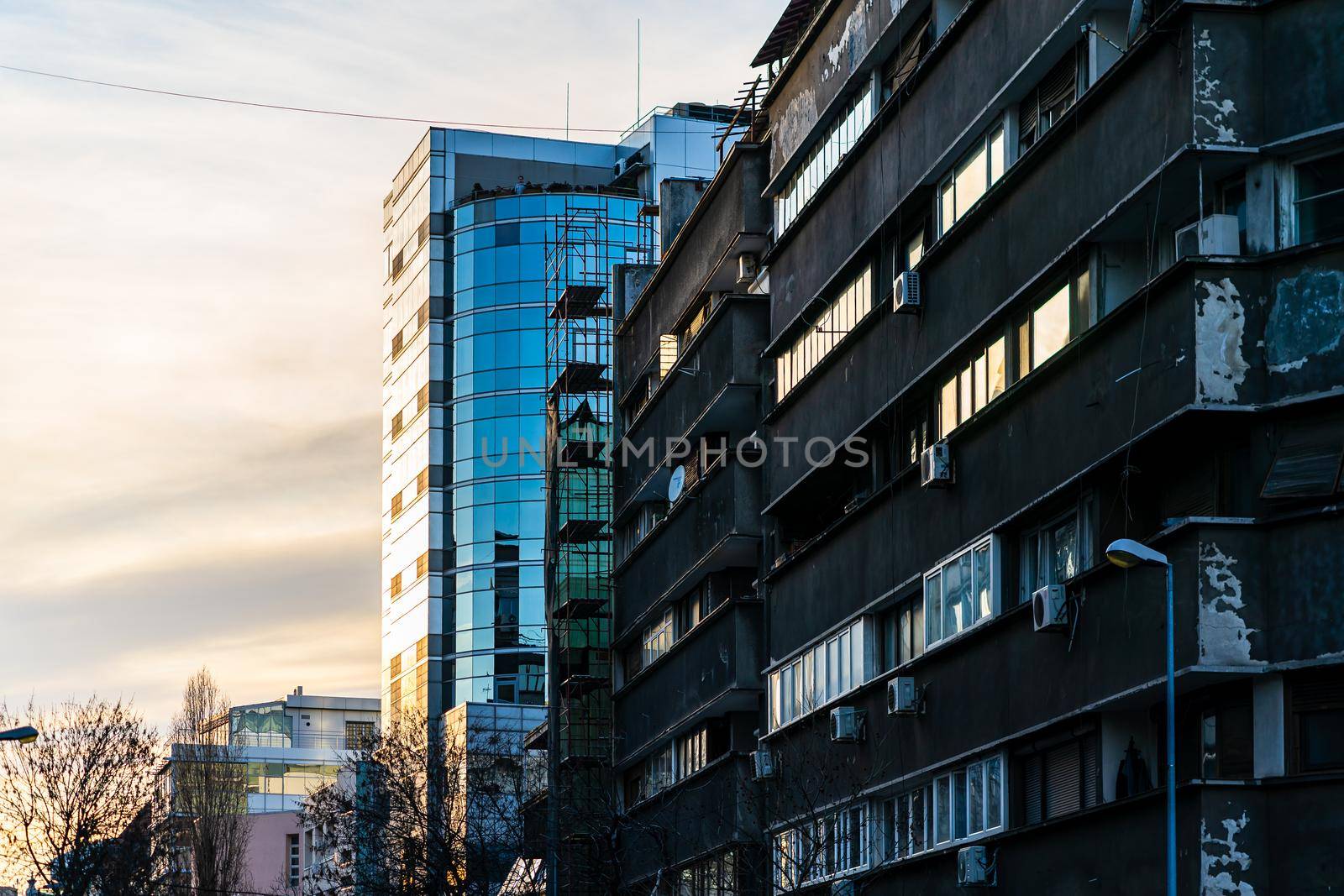 People at zebra crossing, pedestrians crossing the street in downtown area of Bucharest, Romania, 2021 by vladispas