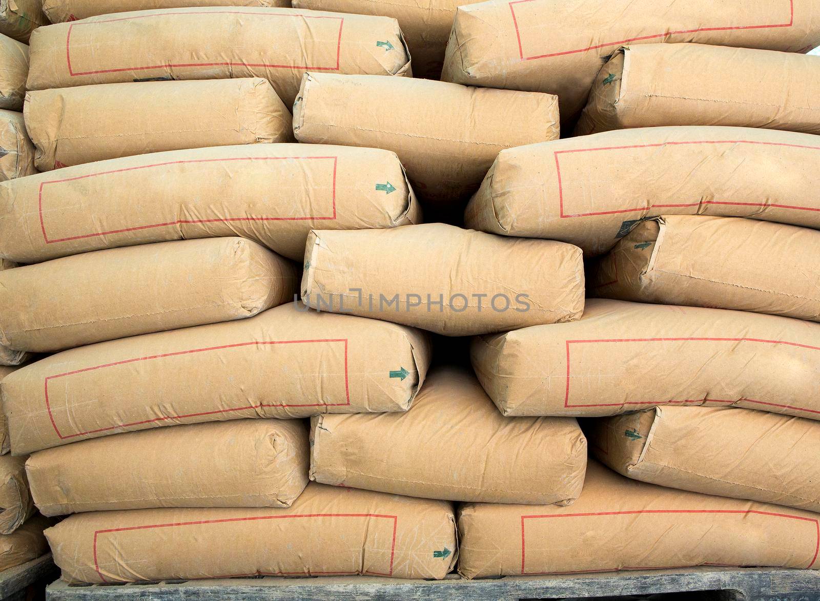 Pile of Cement in bags,neatly stacked for a construction project