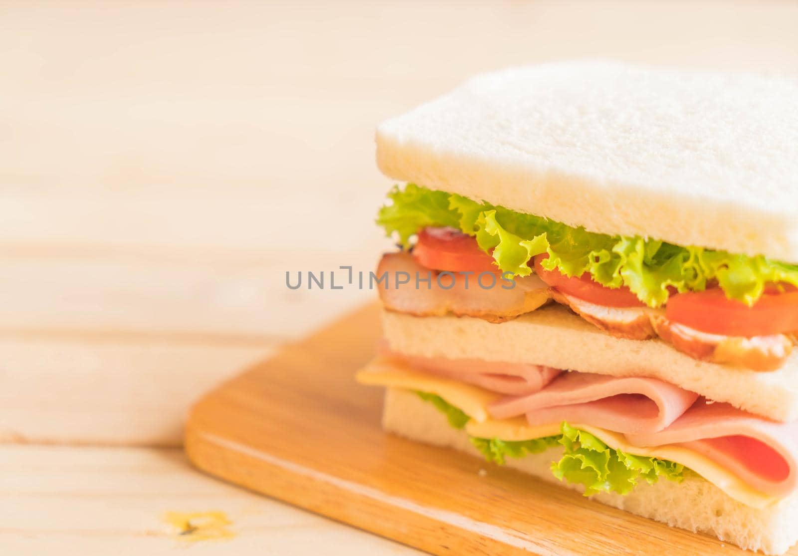 sandwich on wood background