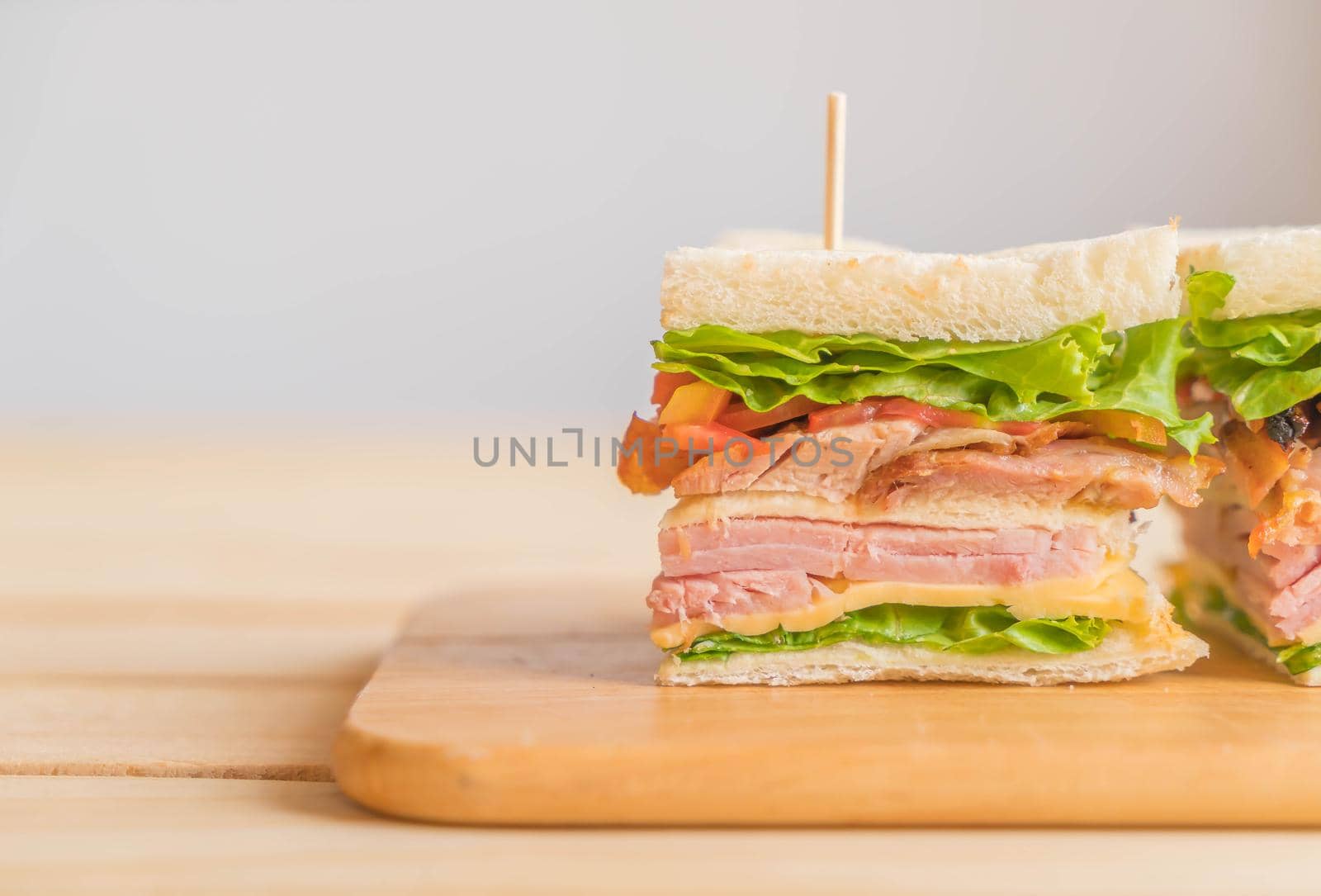 sandwich on wood background