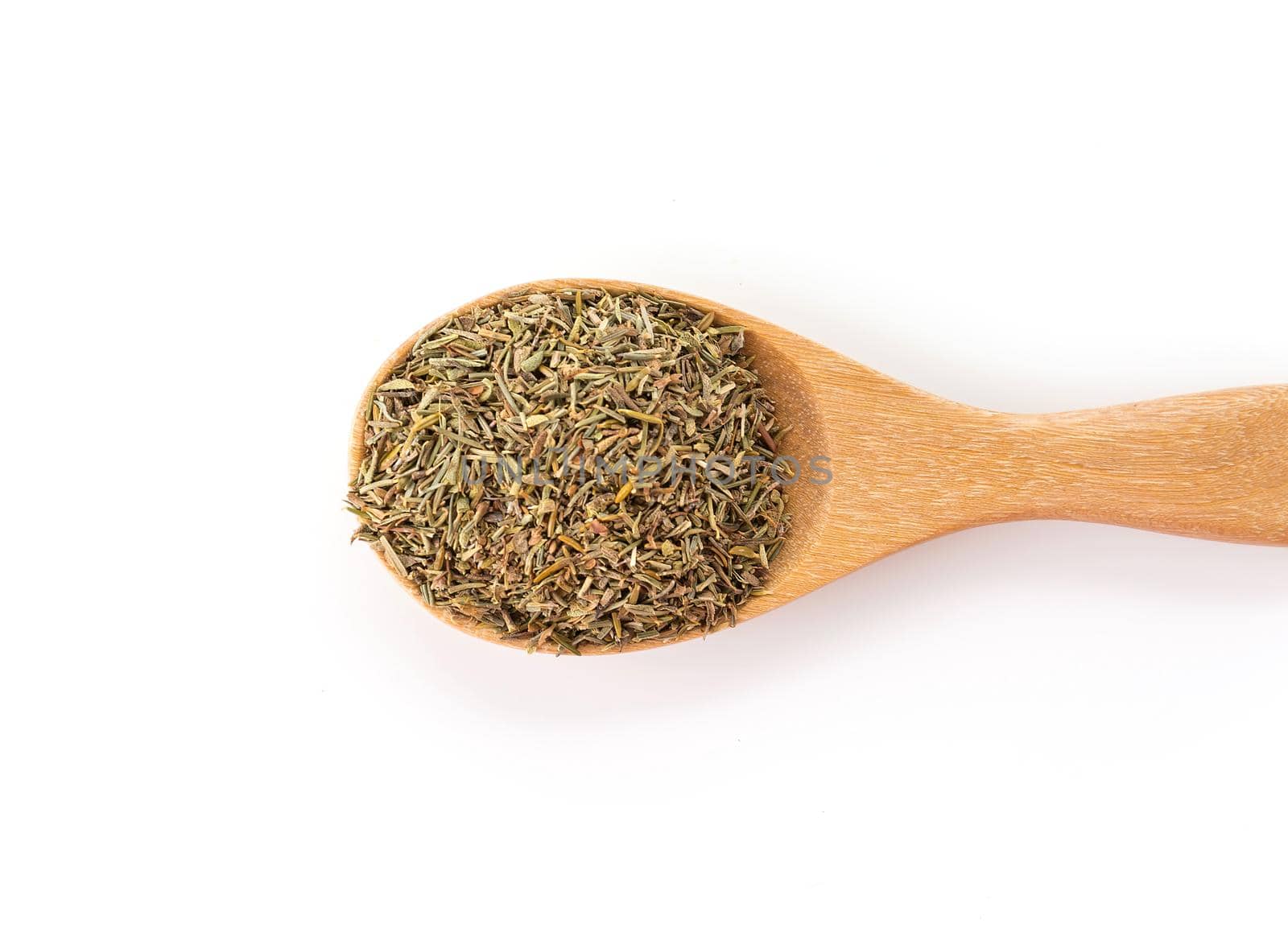 dry thyme on wood spoon