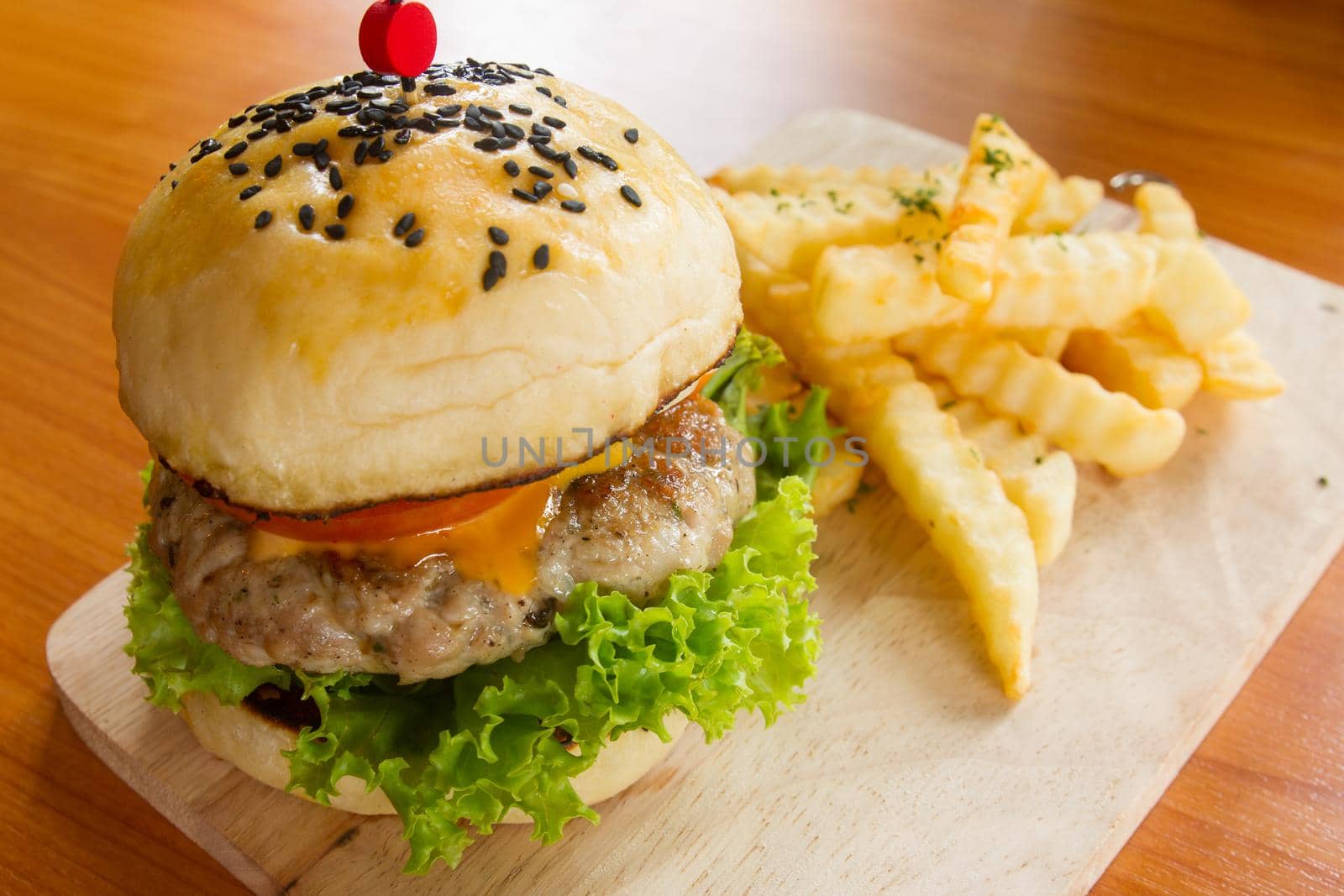 hame made burger on wooden board