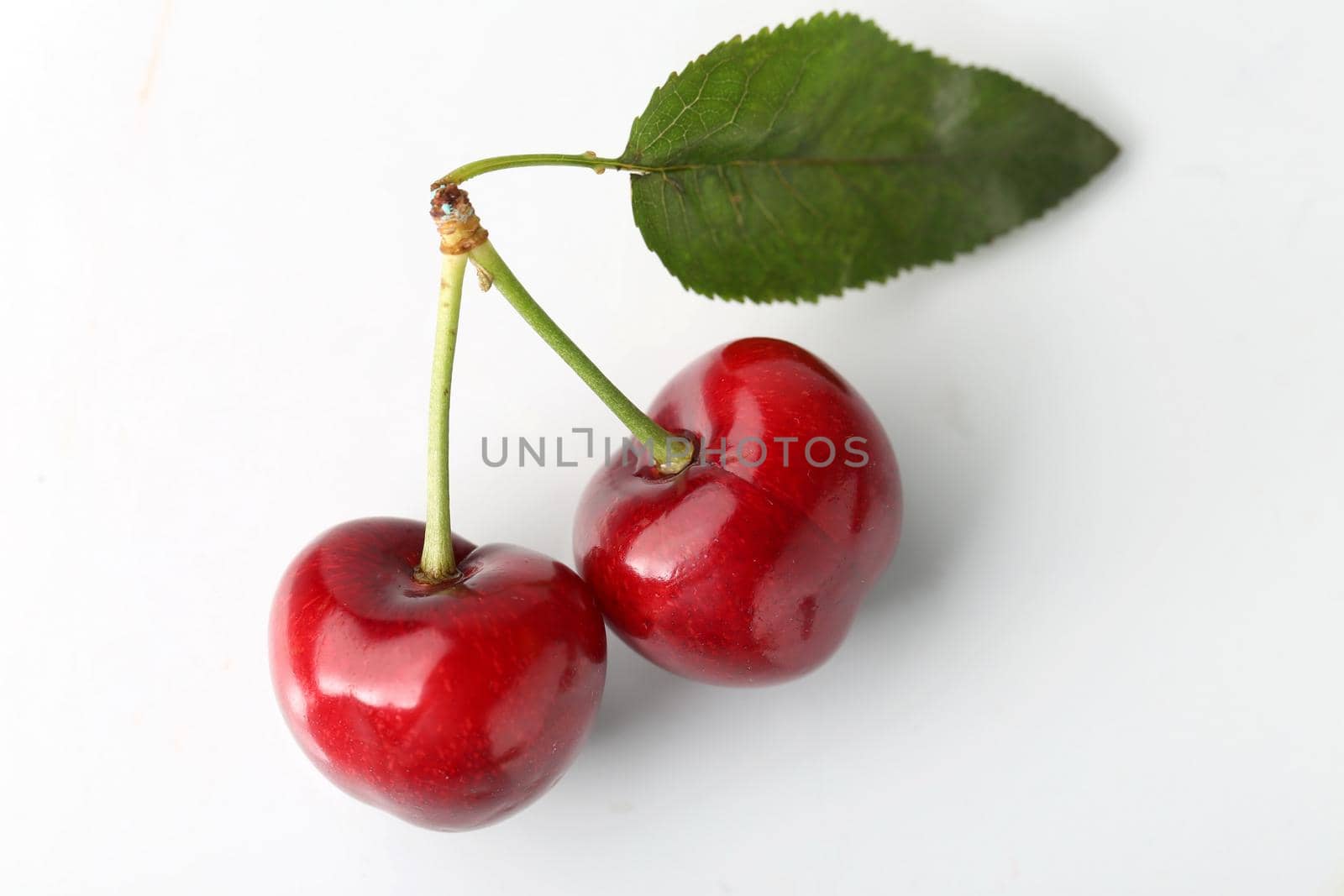 Big cherry on white background