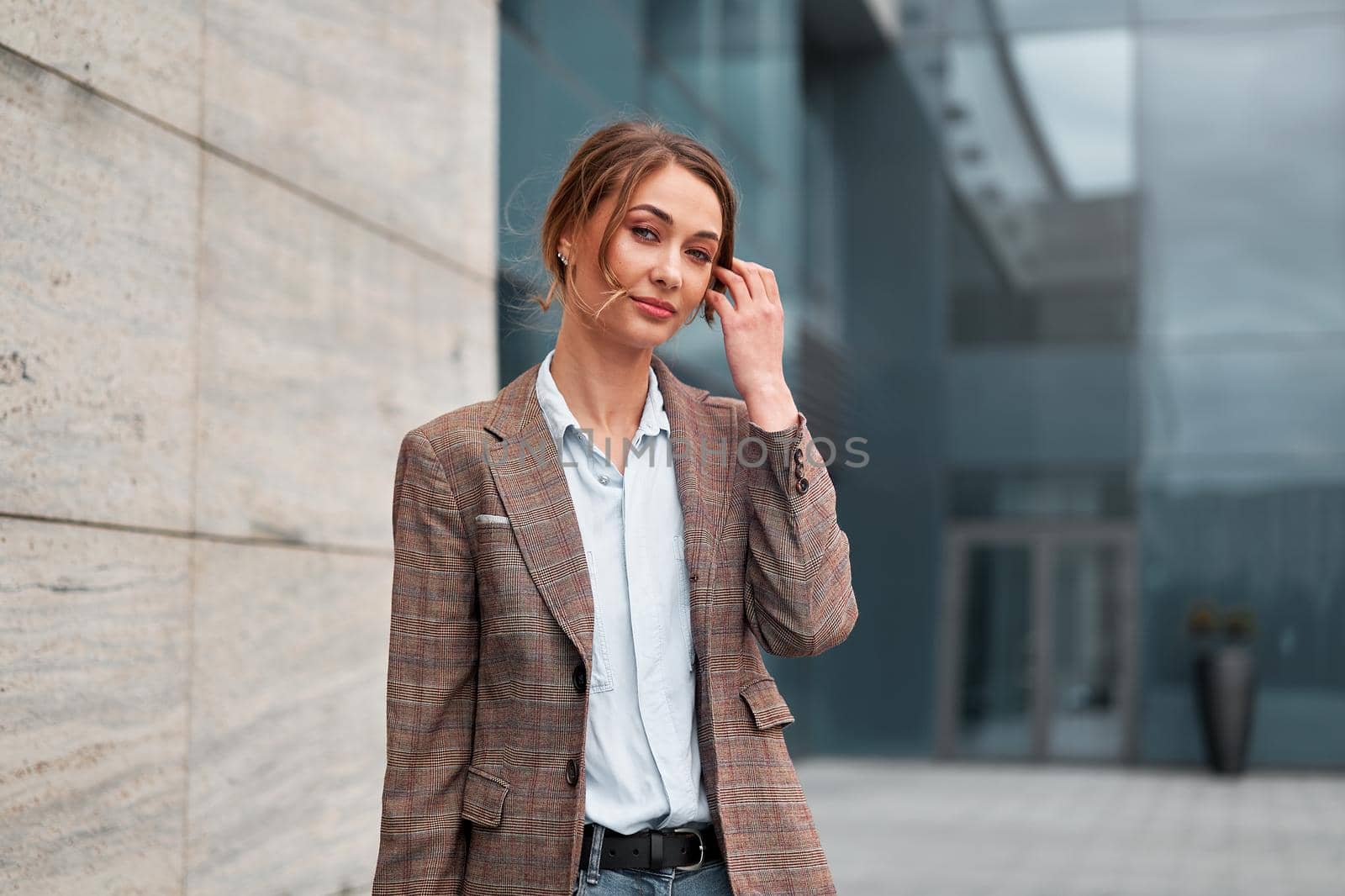 Businesswoman successful woman business person standing outdoor corporate building exterior Pensive elegance cute caucasian confidence professional business woman middle age female Bank worker