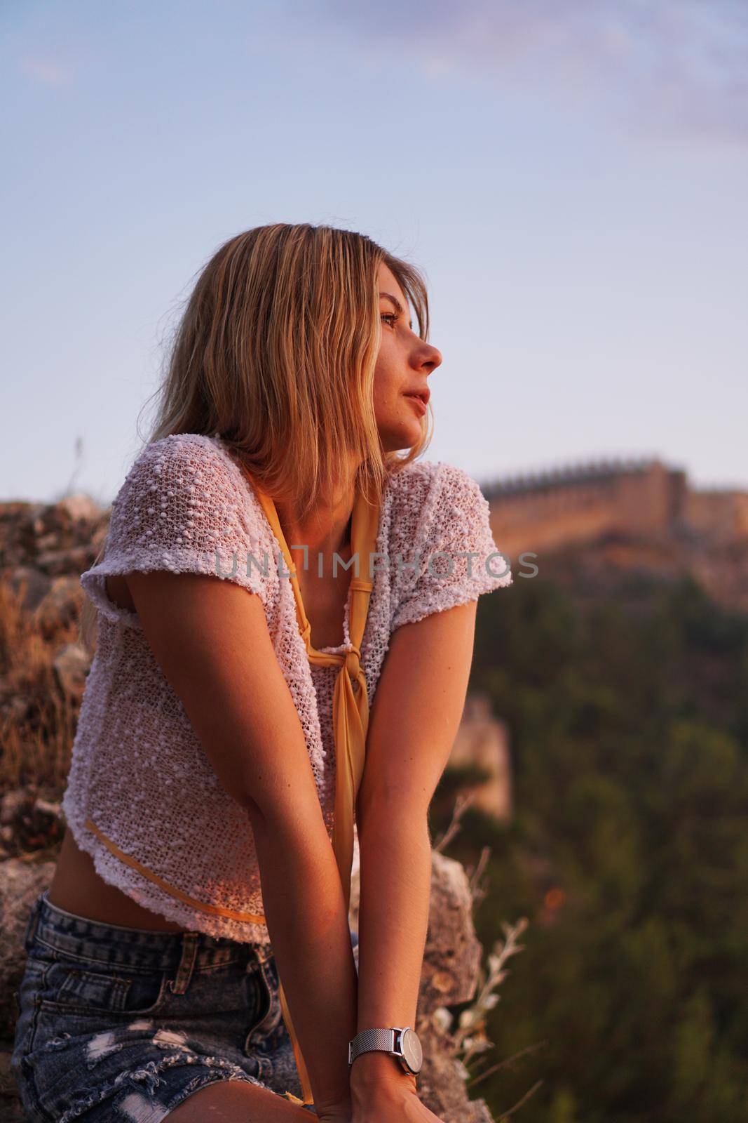 Beautiful girl at sunset. Ancient castle on the background. Alania Turkey by natali_brill