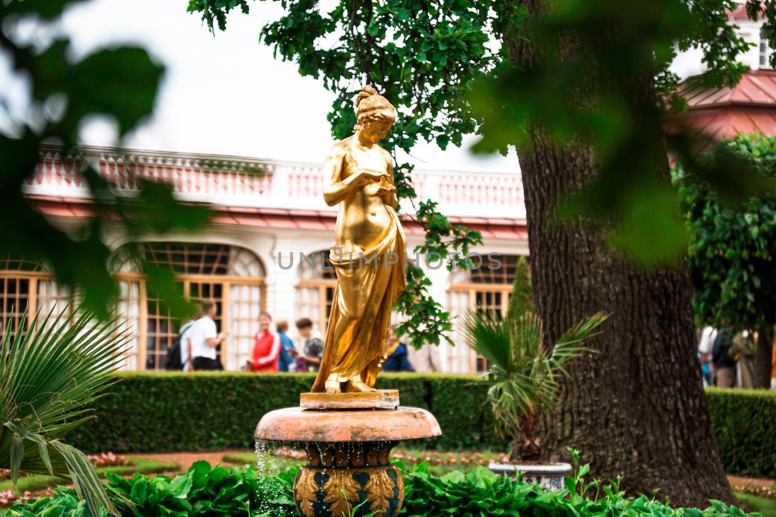 Saint-Petersburg, Russia - Monplaisir garden with a golden statue in Peterhof