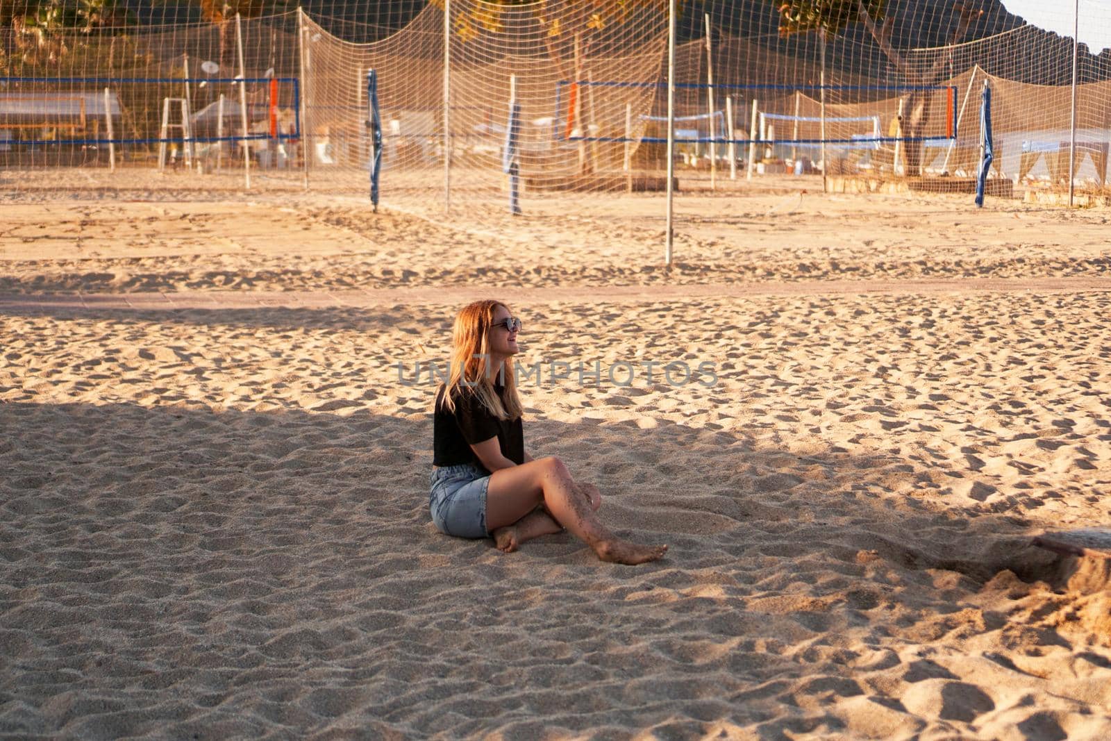 Woman at the summer beach in a hot day by natali_brill