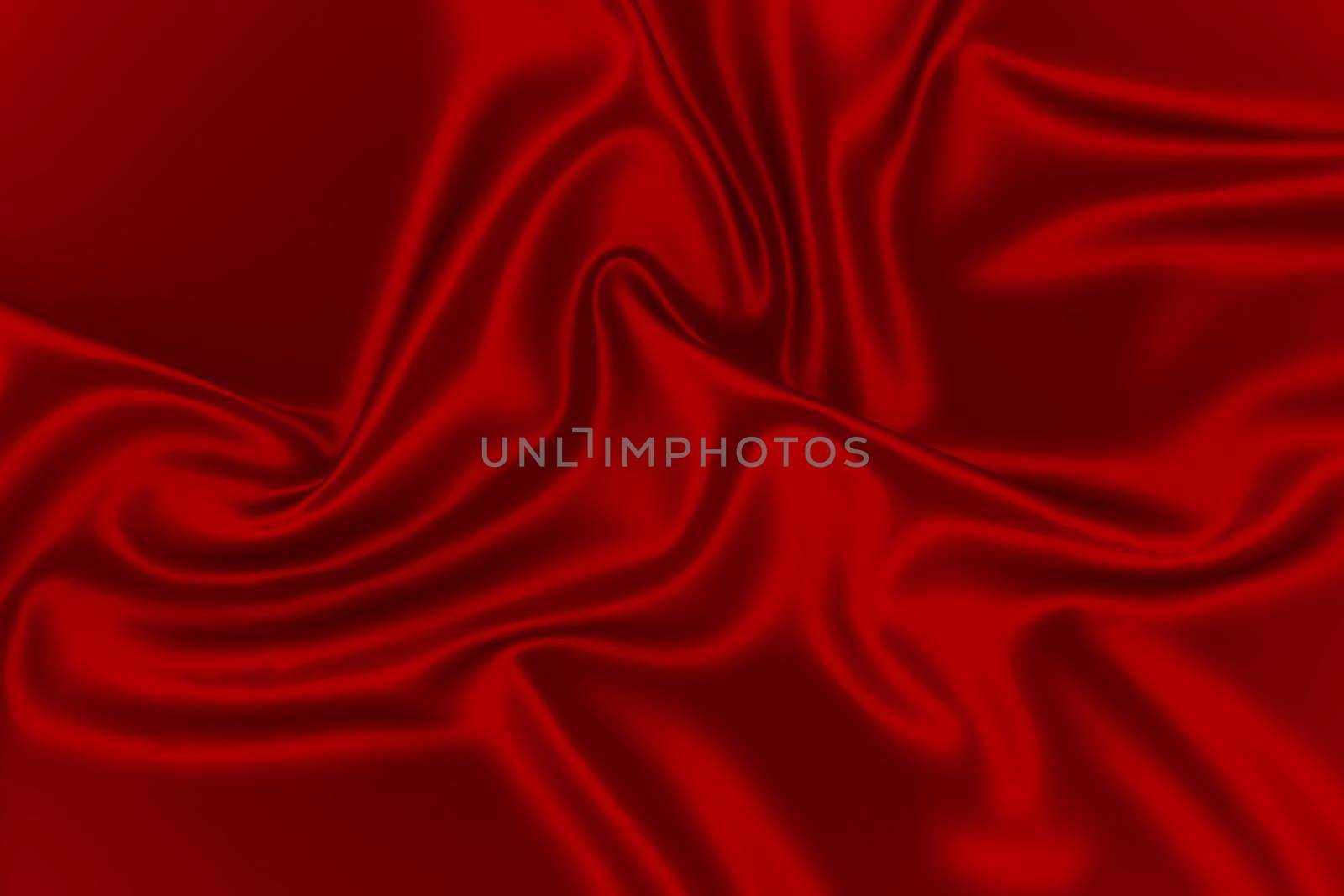 Closeup of ripples in red silk fabric