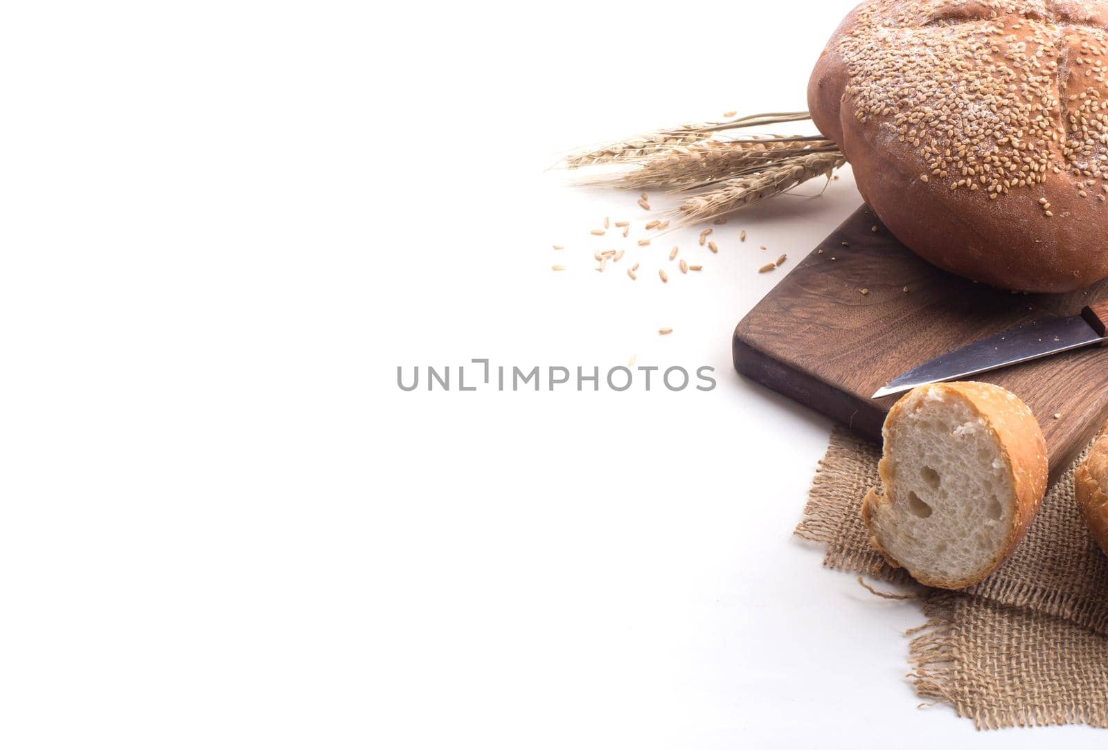 Black coffee and whole wheat bread for breakfast on white background