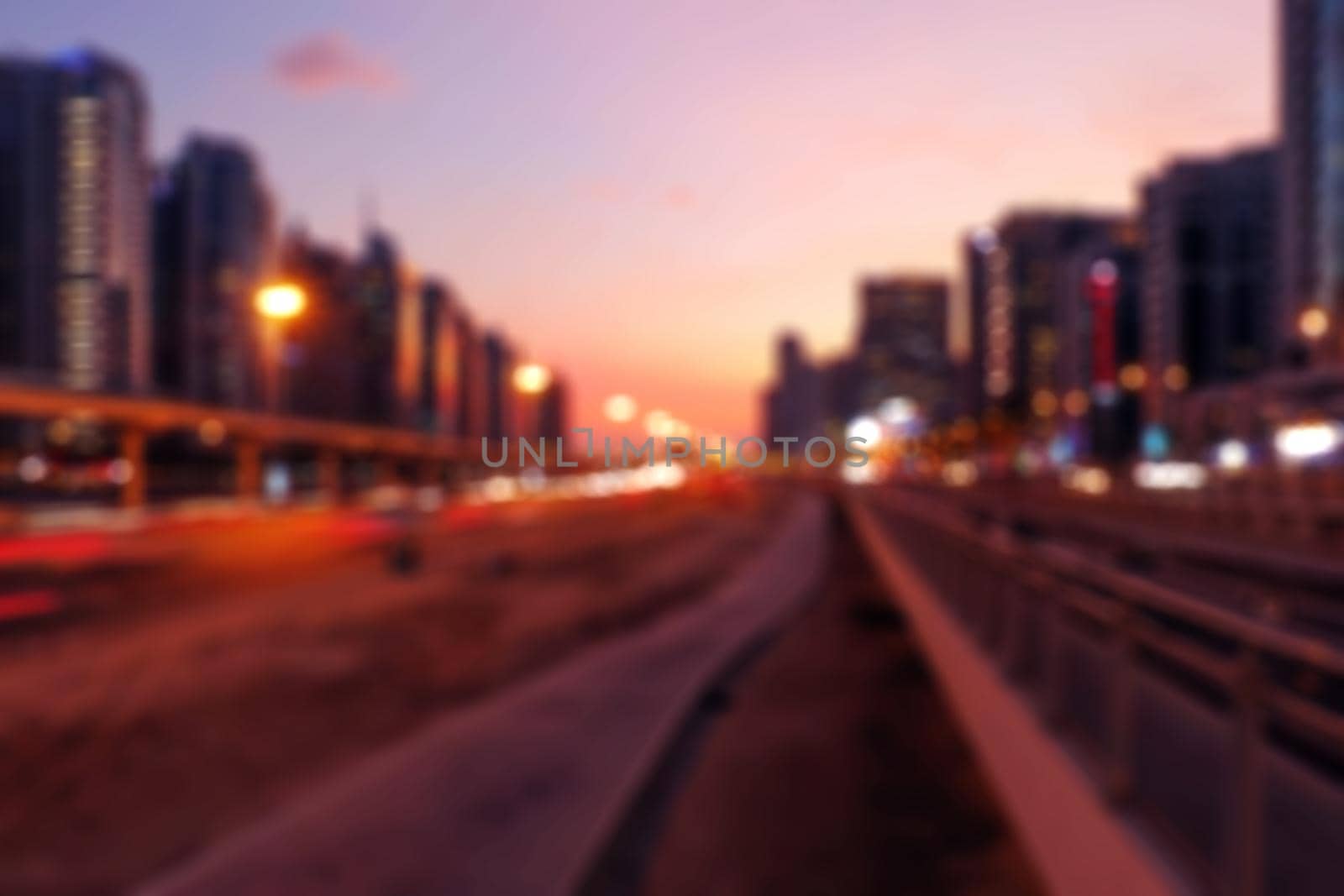 Vintage abstract with sunset city bokeh. Summer party background. Urban cityscape blur background.
