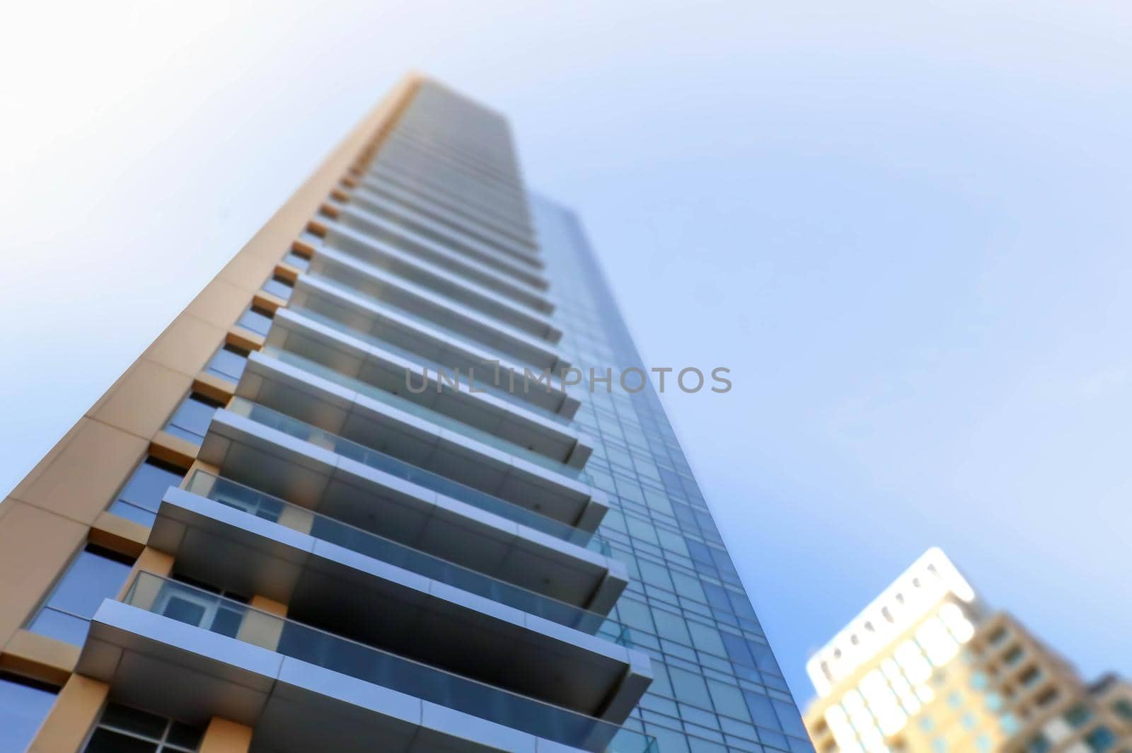 Blue building perspective exterior - modern architecture , glass facade. Urban cityscape of modern city.