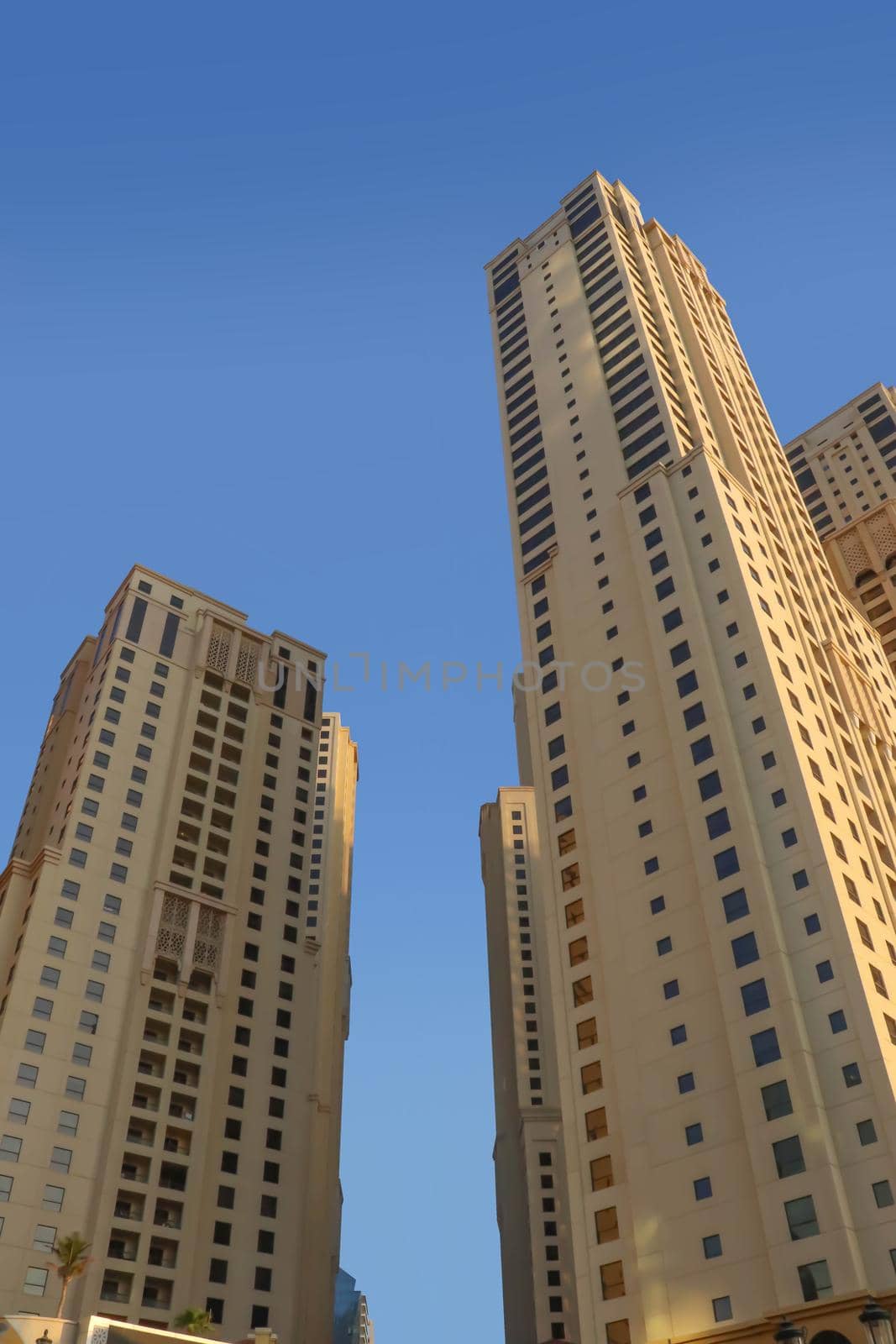 Dubai, UAE December 25 2018 Dubai hotels at summer day. by DmytroRazinkov