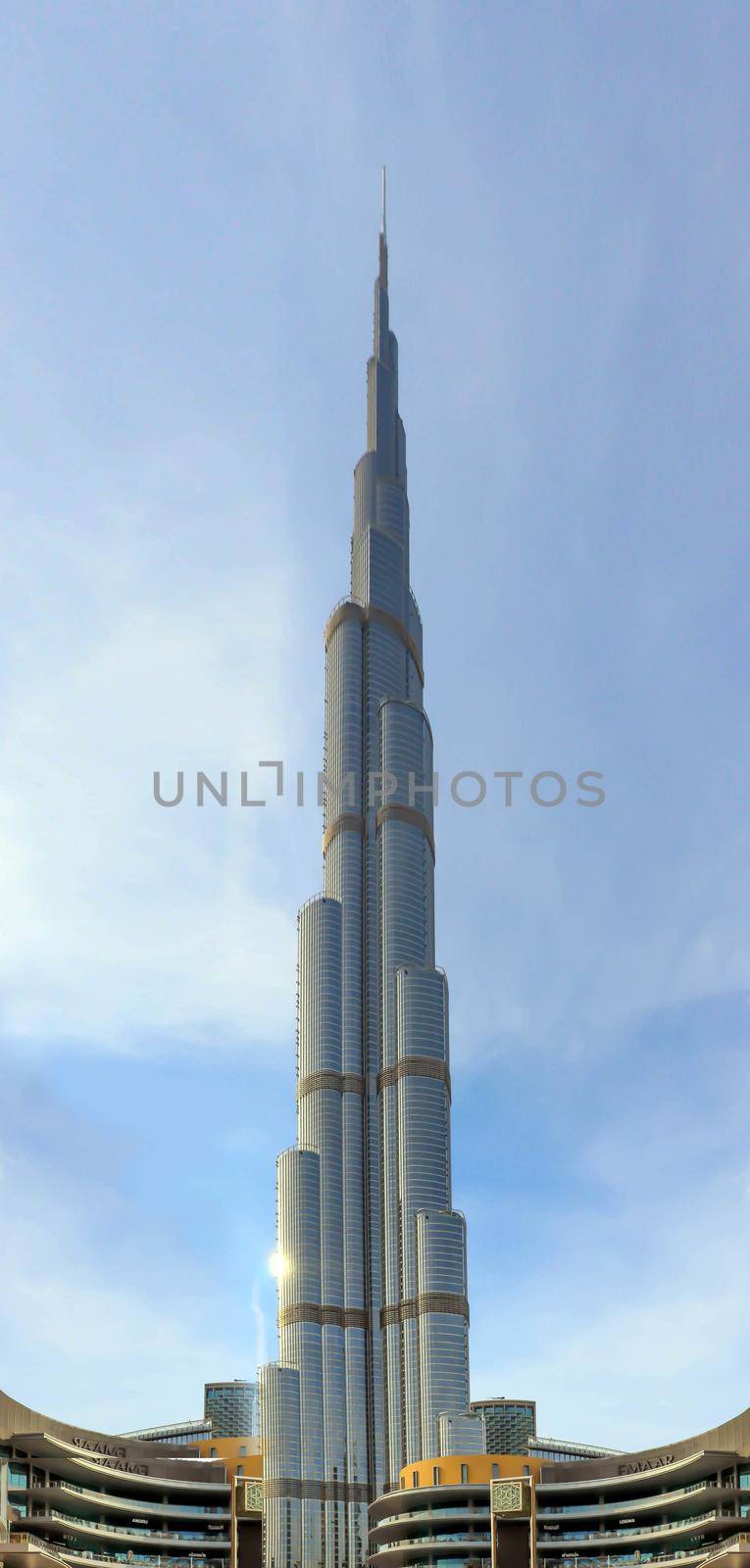 Arabic burj khalifa. Architecture building. Night dubai skyline. Dubai city background. Uae urban cityscape. Aerial view. Blue background. Panoramic view. Sky blue. United arab emirates.