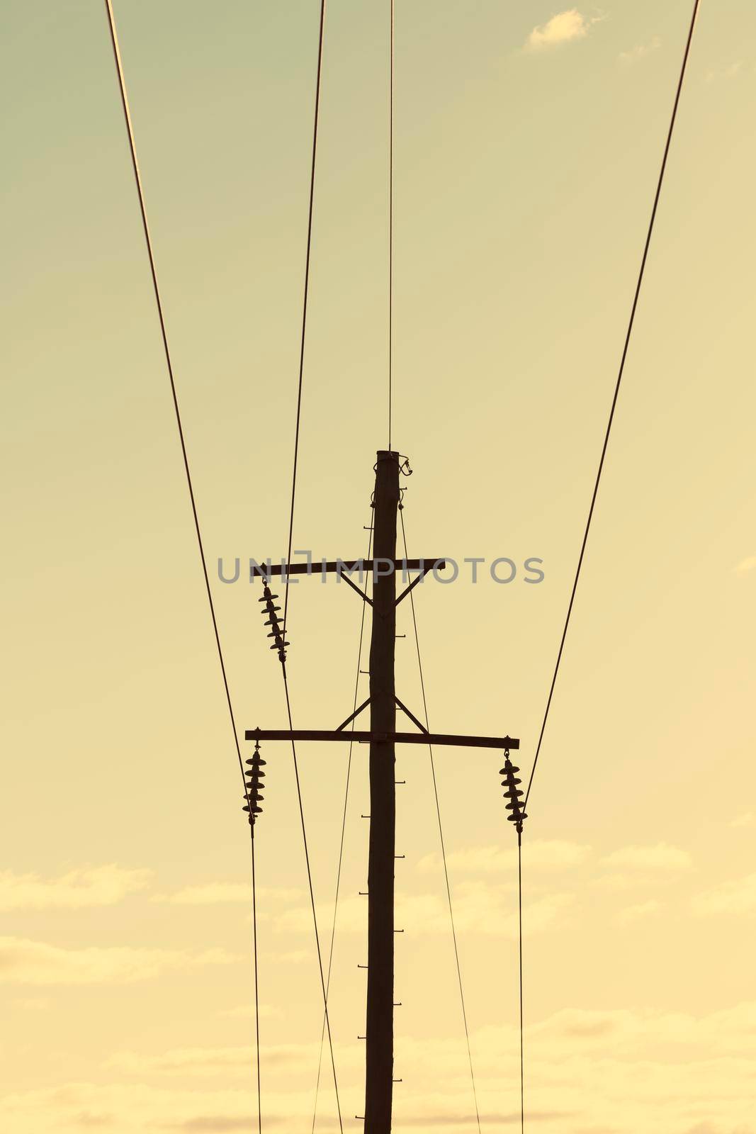 Photograph of a wooden telephone post and cables by WittkePhotos