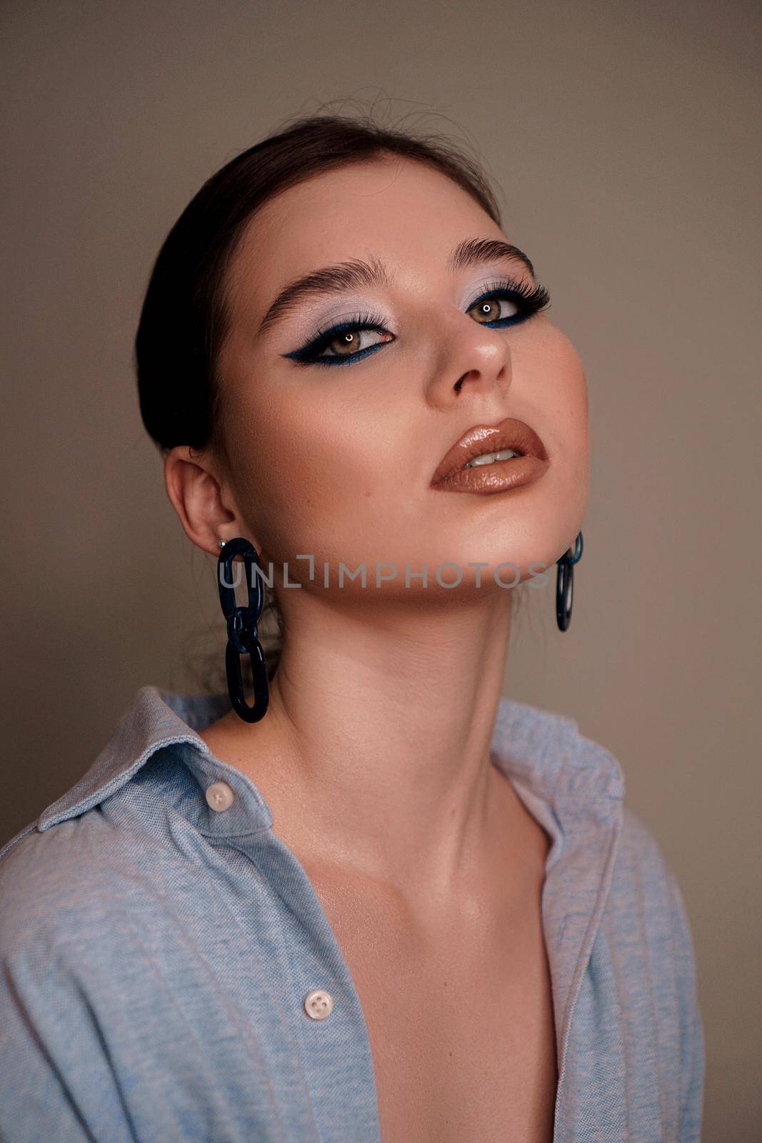 Beauty portrait with professional blue makeup. Fashion portrait by natali_brill