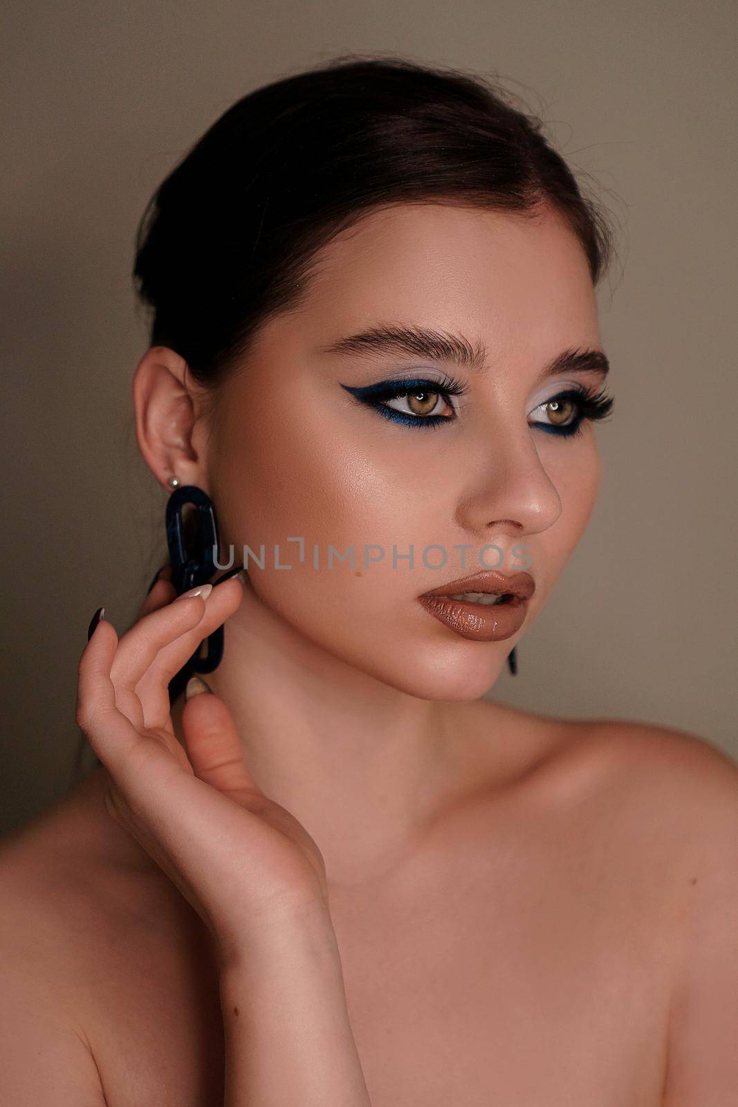 Beauty portrait with professional blue makeup. Fashion portrait by natali_brill