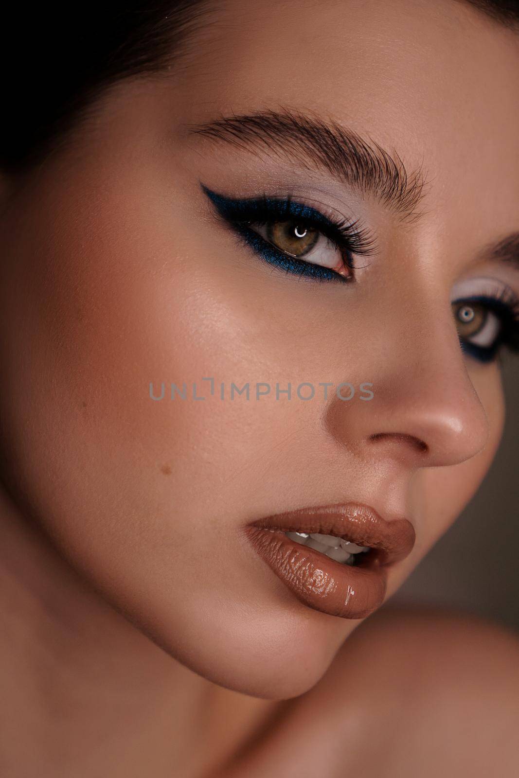 Beauty portrait with professional blue makeup. Fashion portrait by natali_brill