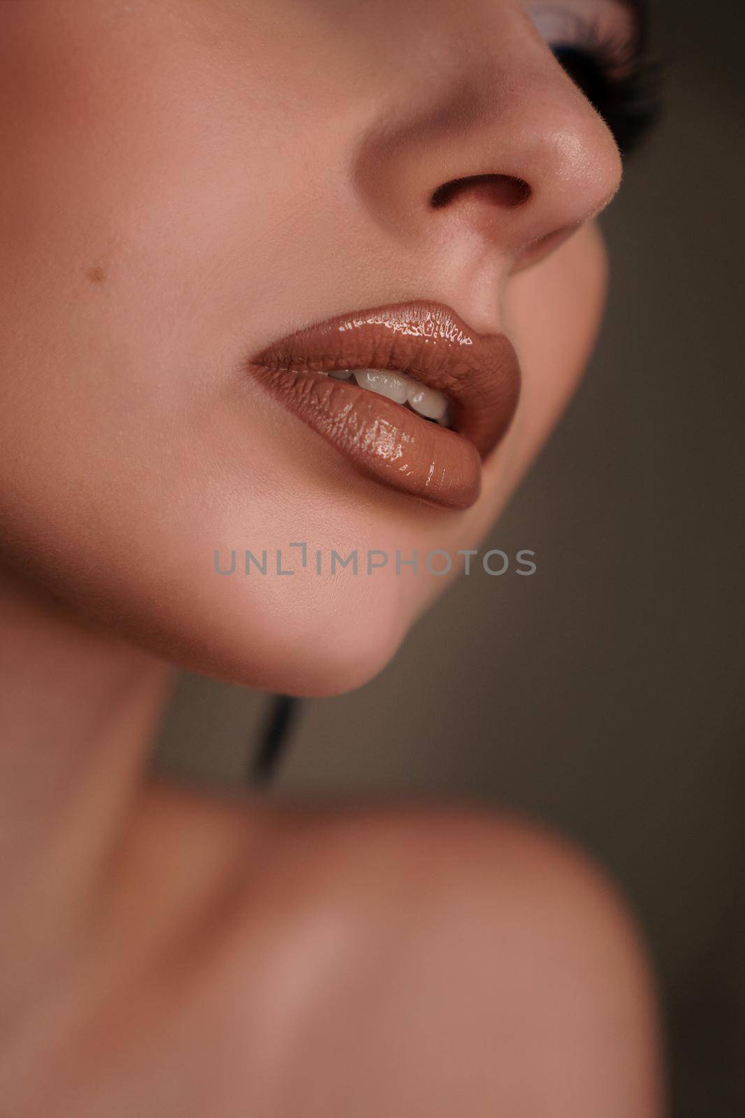 Close up of a female face - lips. Beauty portrait with professional makeup by natali_brill