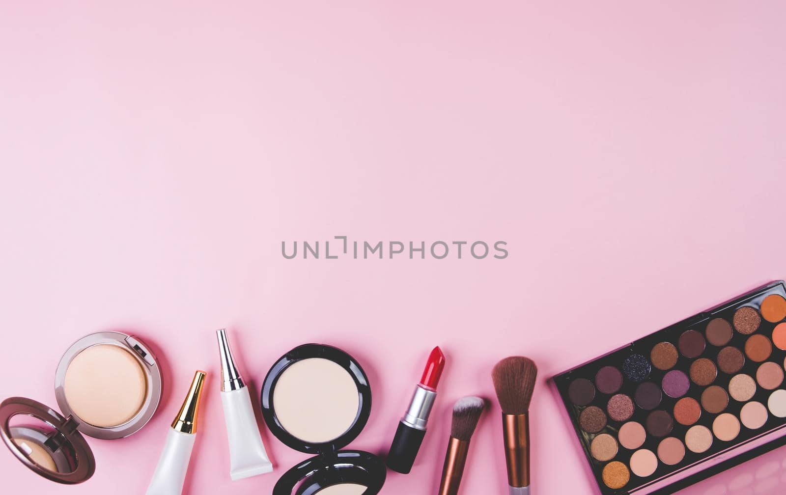 Set of cosmetic makeup tool isolated on pink background, top view, flat lay, brush and lipstick and makeup palette kit, no people, nobody, copy space, group object about beauty, collection make-up.