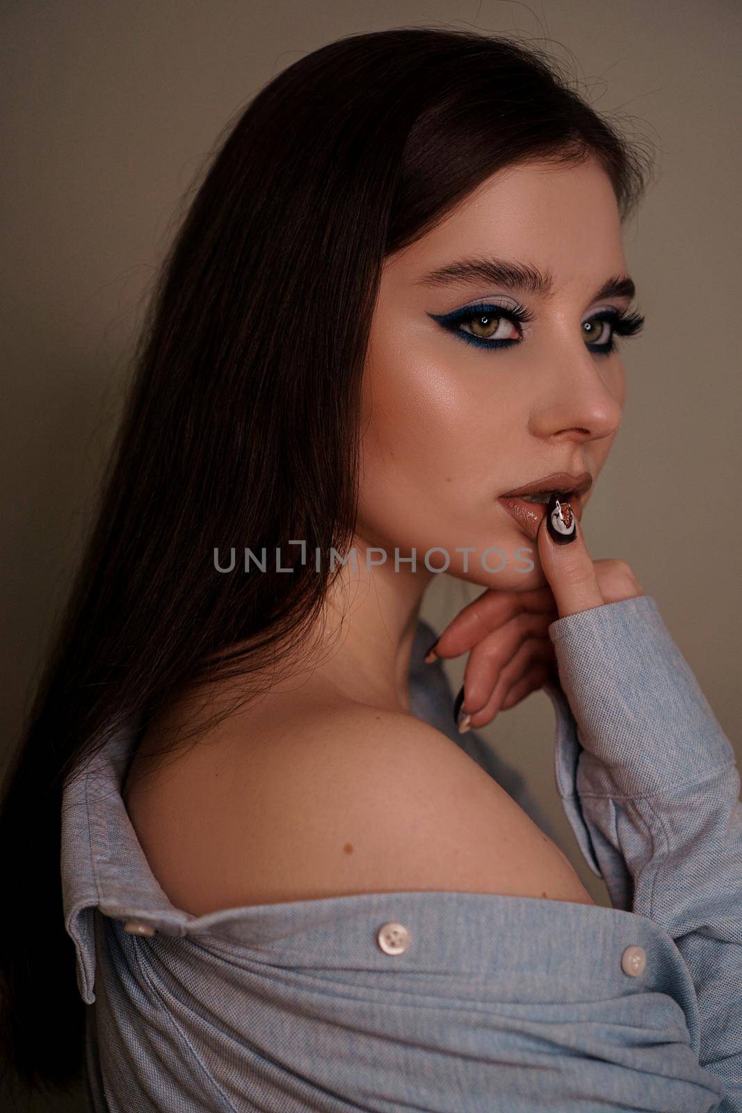 Beauty portrait with professional blue makeup. Fashion portrait by natali_brill