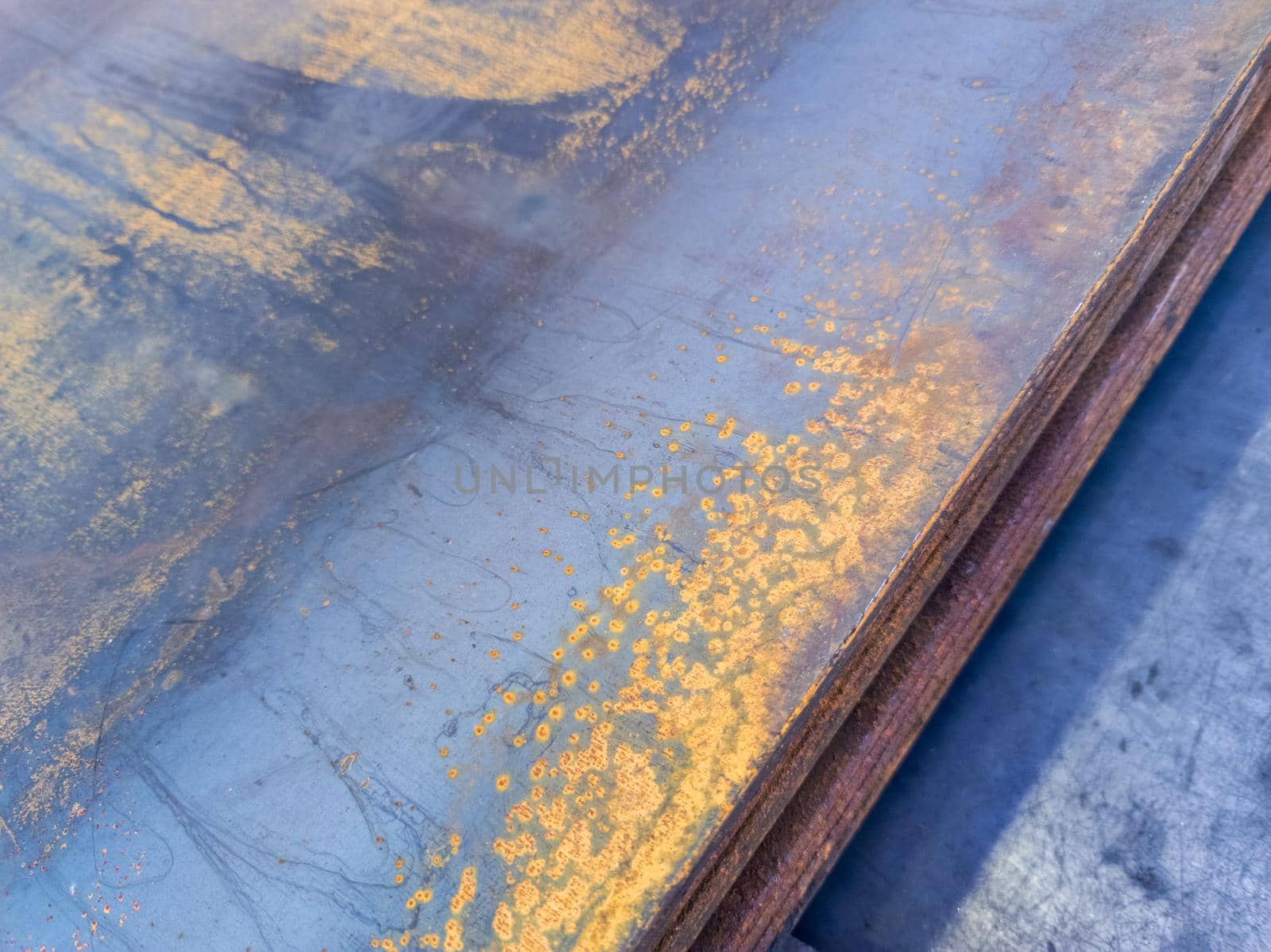 stack of rusted sheet metal - close-up with selective focus.