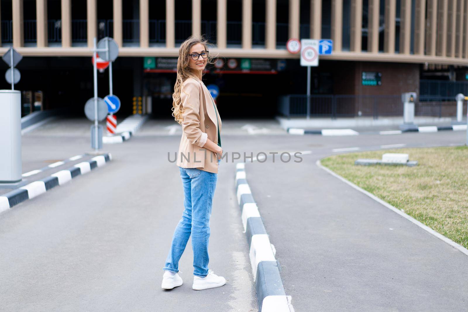Business Woman Standing Near Indoor Parking Garage Caucasian Female Middle Age Woman in Glasses Outdoors Business Person