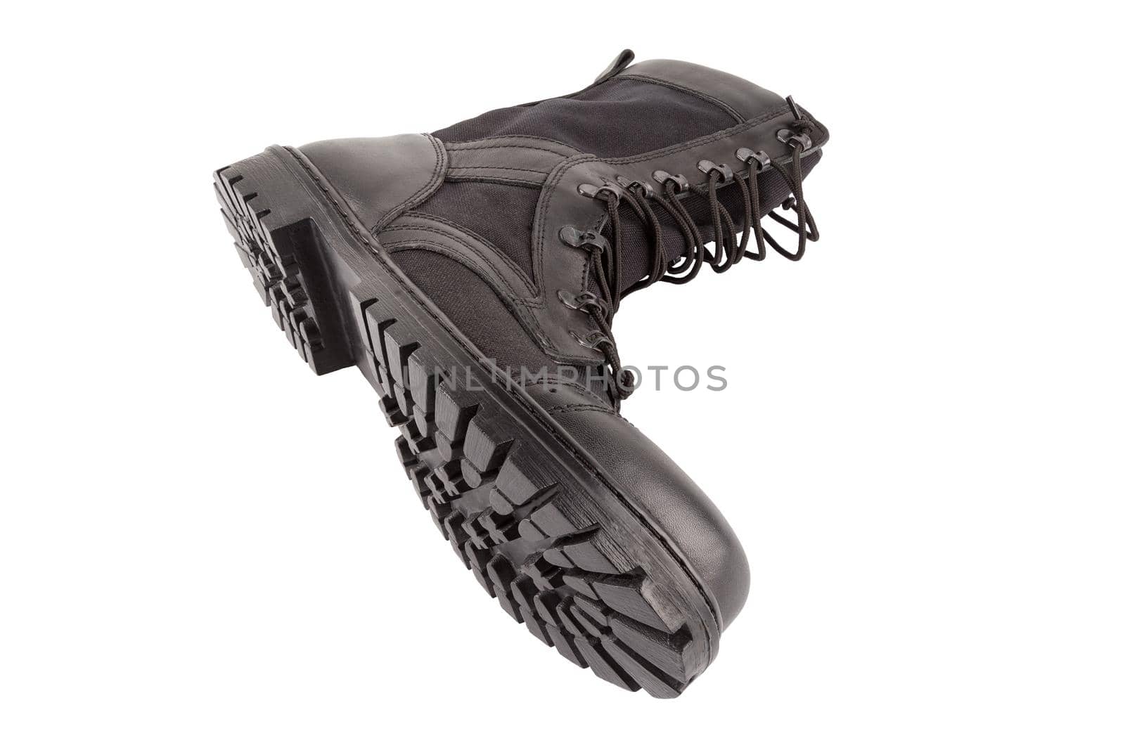 new black summertime lightweight military boot with nylon parts isolated on white background.