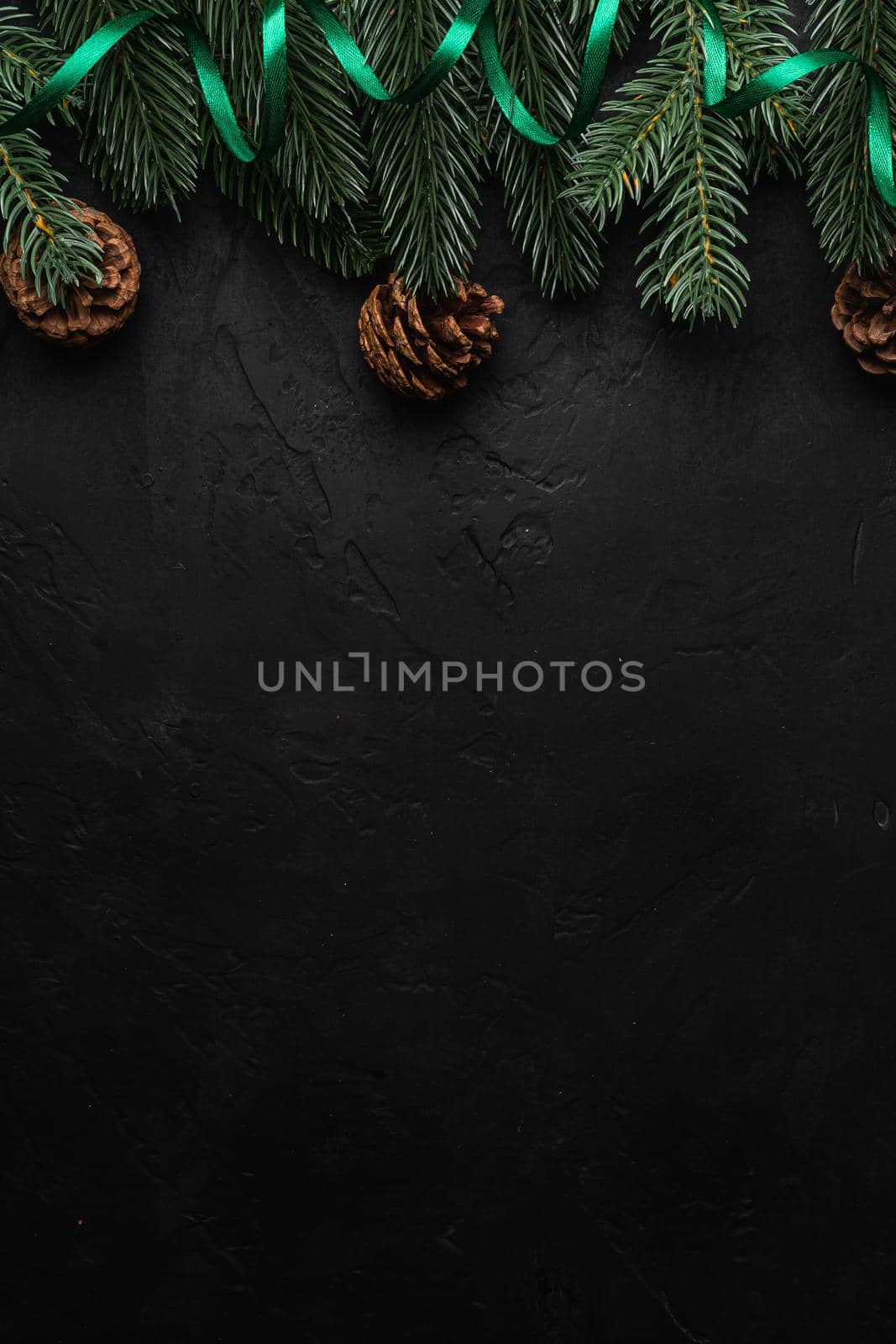 Christmas holidays composition. Green ribbon, fir-tree and pine cones. Copy space by Frostroomhead