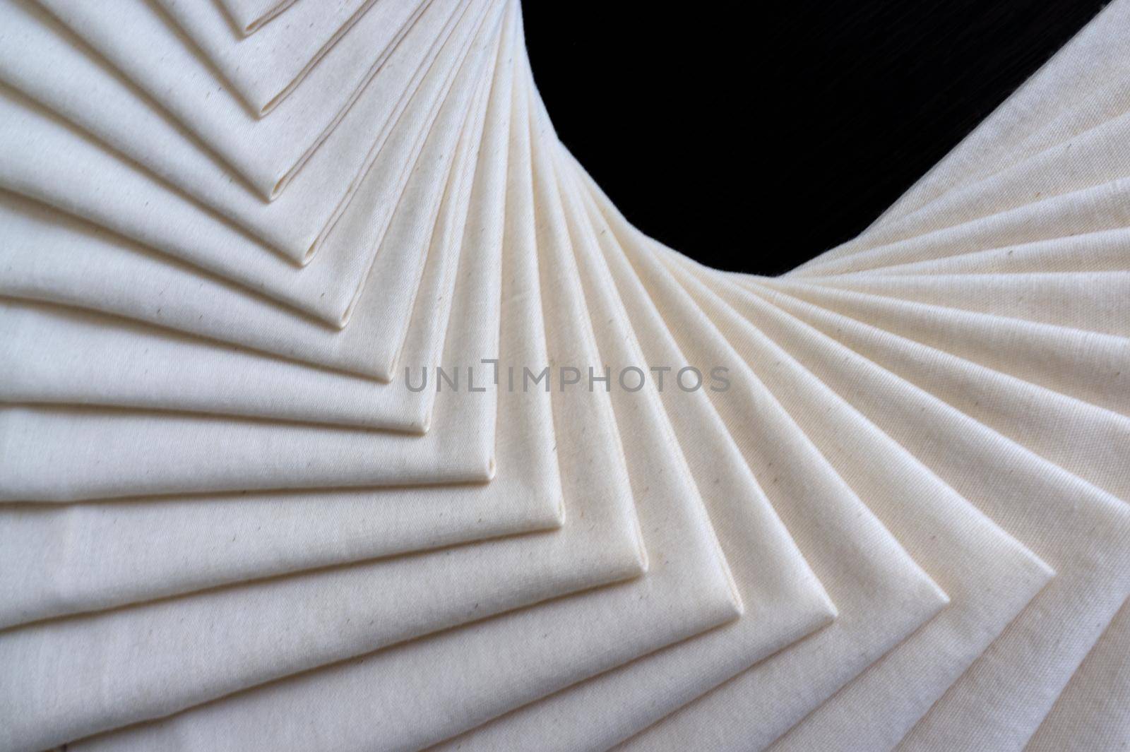 White Fabric folded of stacked . Fabric texture background