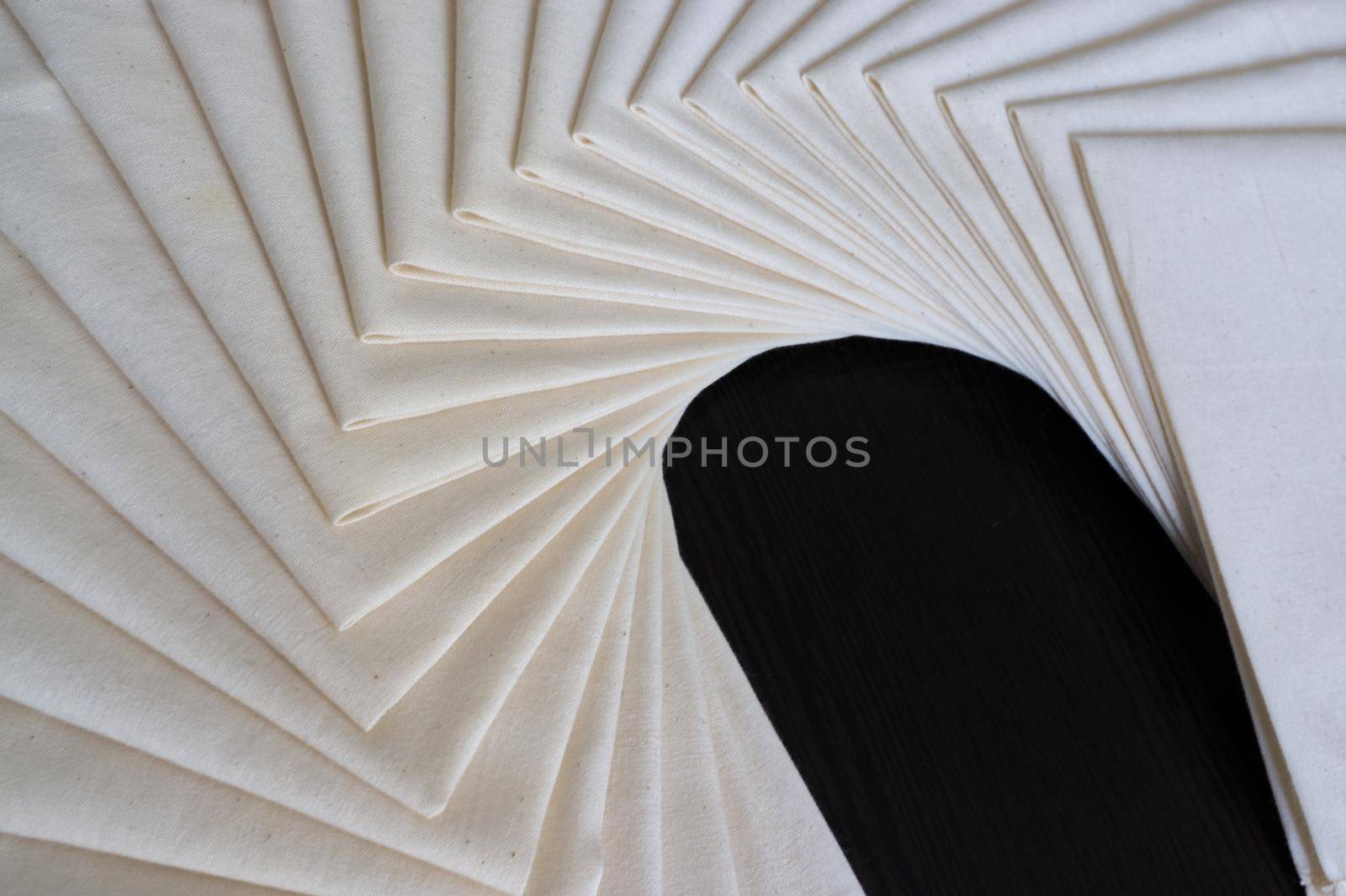 White Fabric folded of stacked . Fabric texture background . Concept workshop