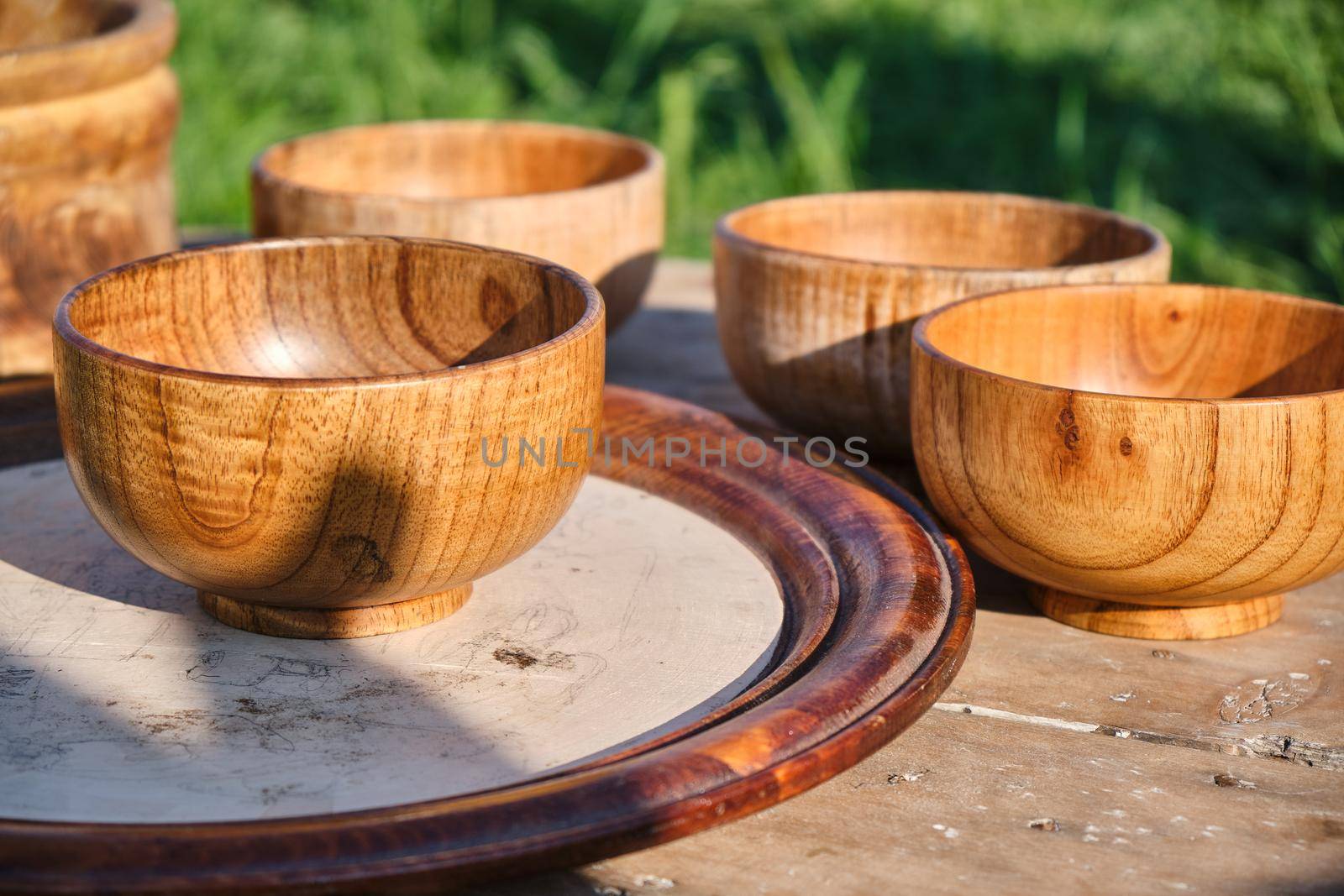 Wooden dishes on the table on the background of nature, Kazakhstan