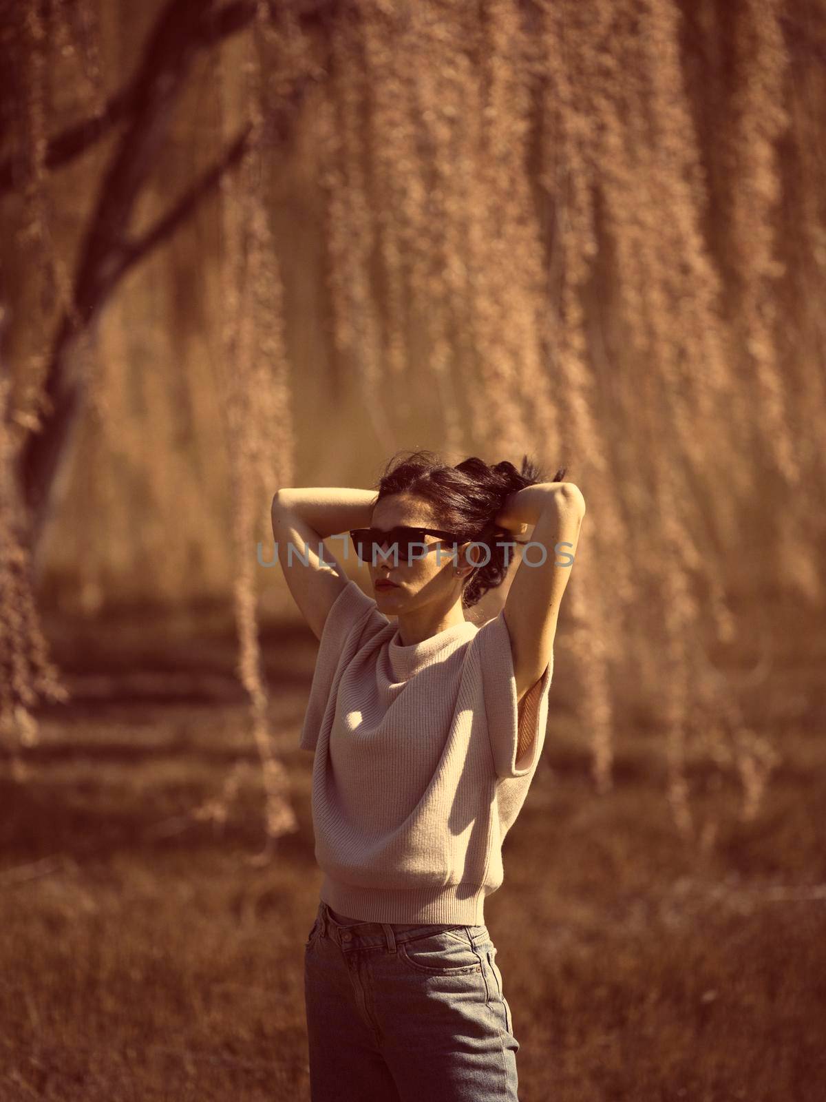 Fashion woman outdoor in spring scenery