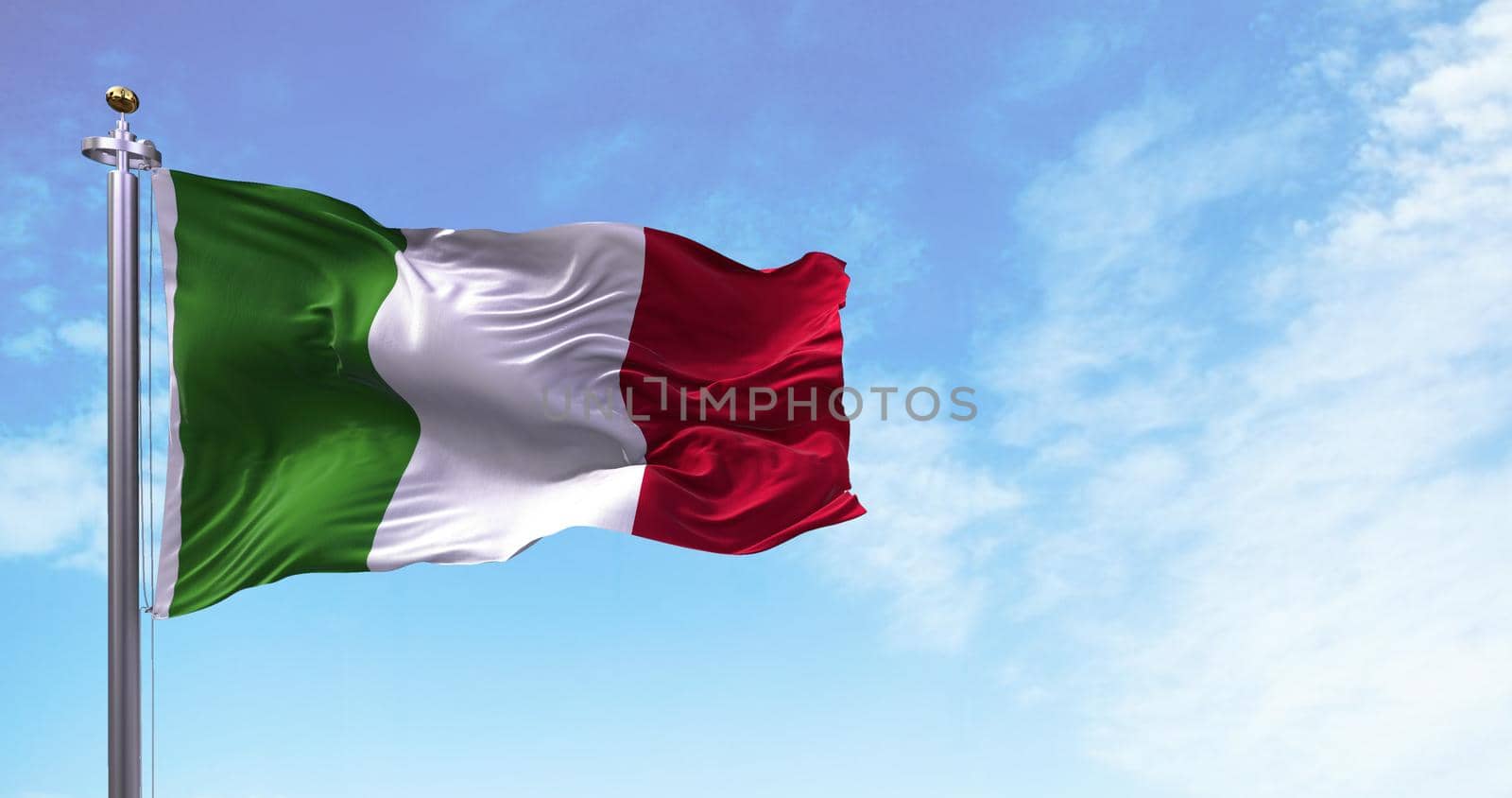The national flag of Italy flying in the wind. Outdoors and sky in the background. Democracy and independence. European state