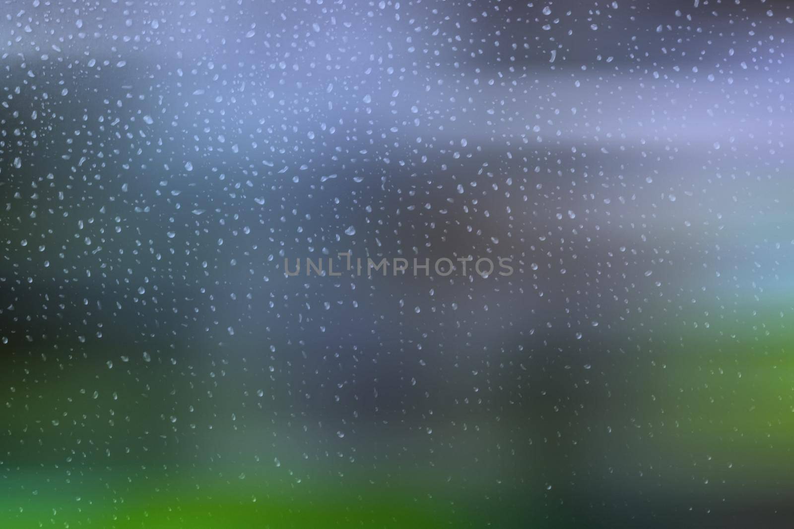 Small raindrops on a window by clusterx