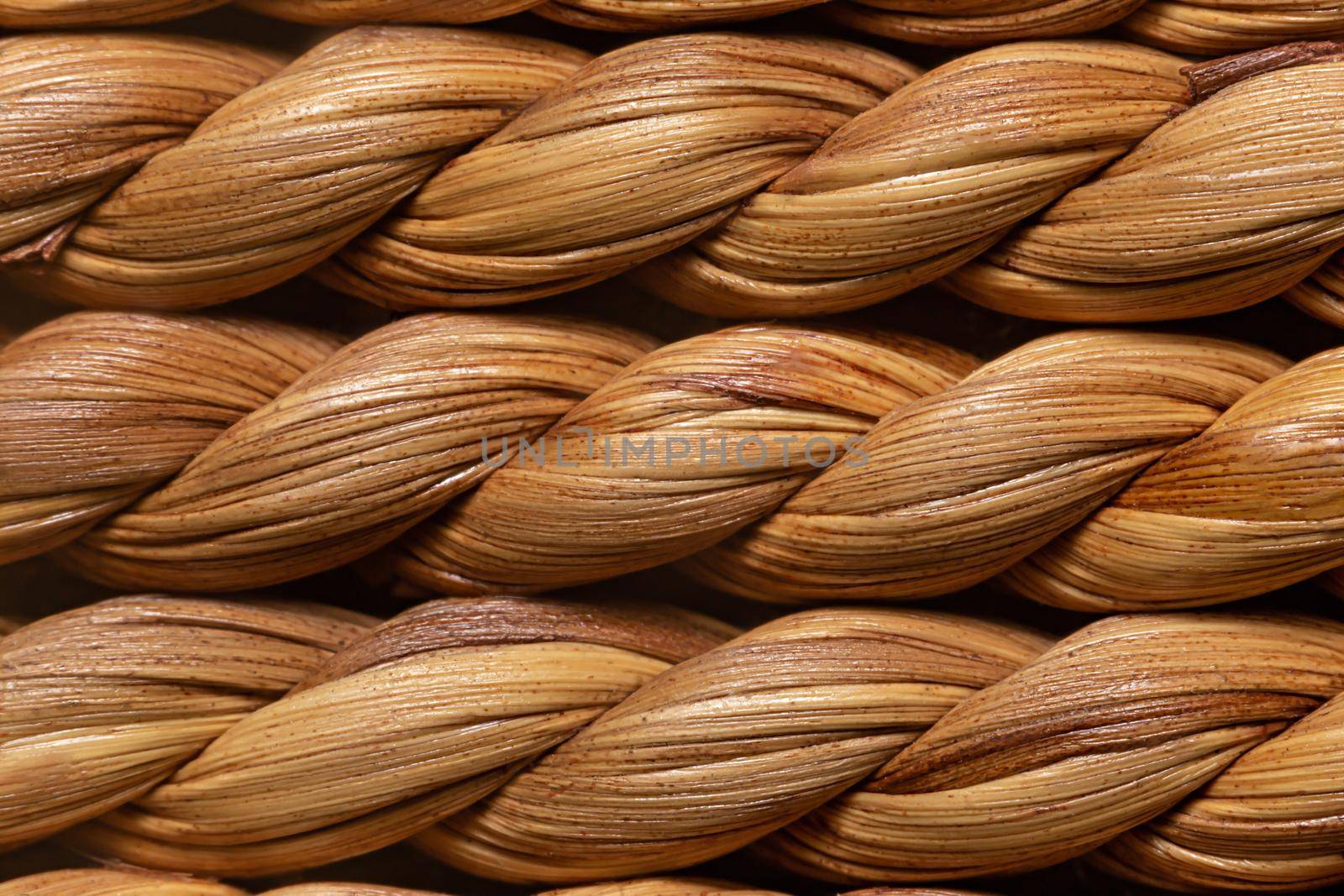 Rattan macro photo texture. Natural woven straw pattern