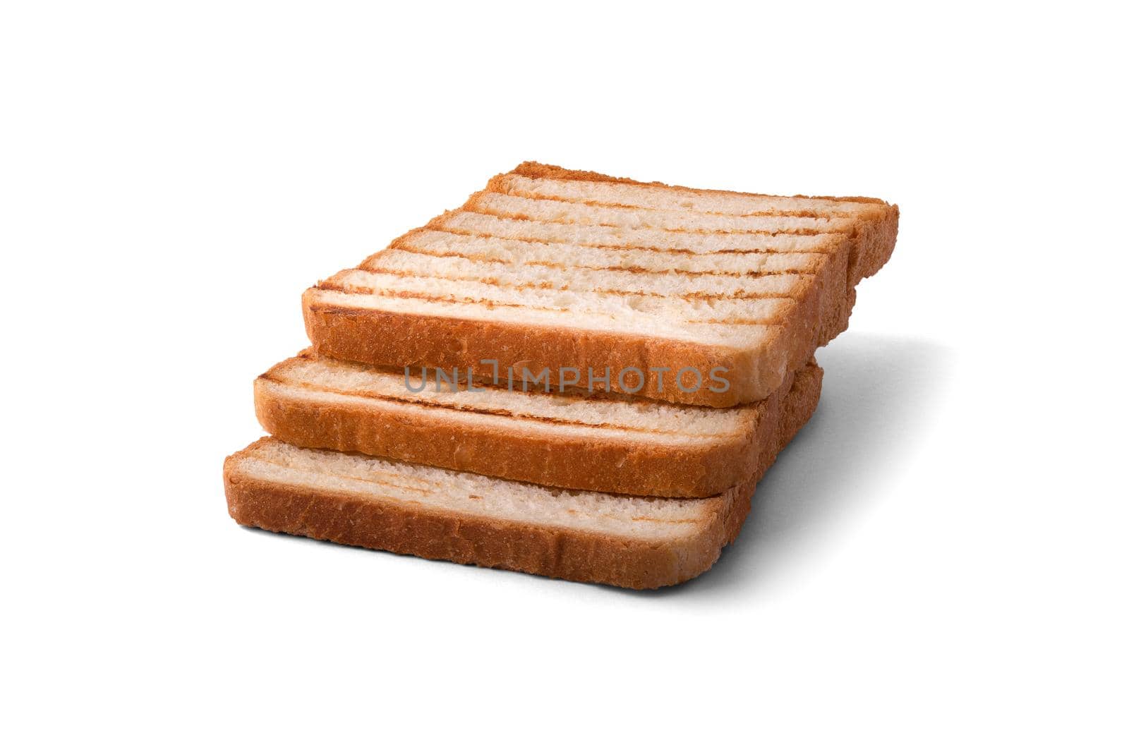 Slices of toast bread grilled with a golden crust isolated on white background