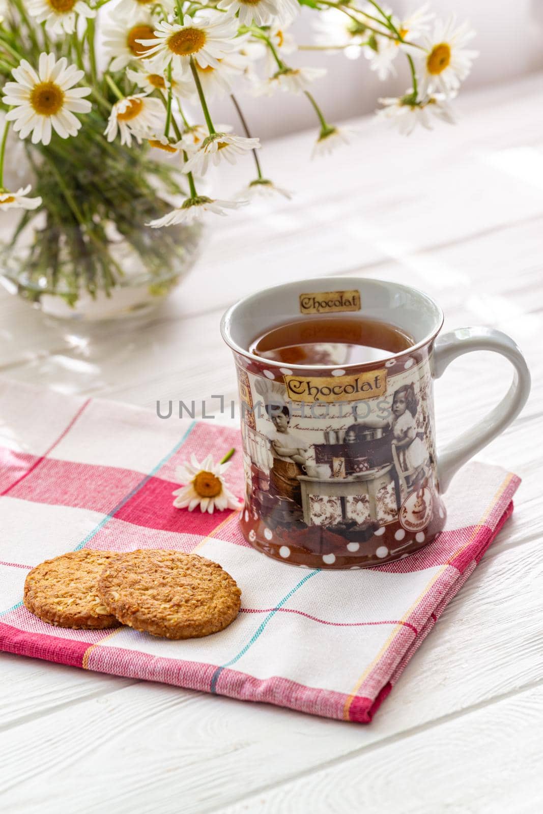 Still life with a cup of tea, cookies and daisies by clusterx