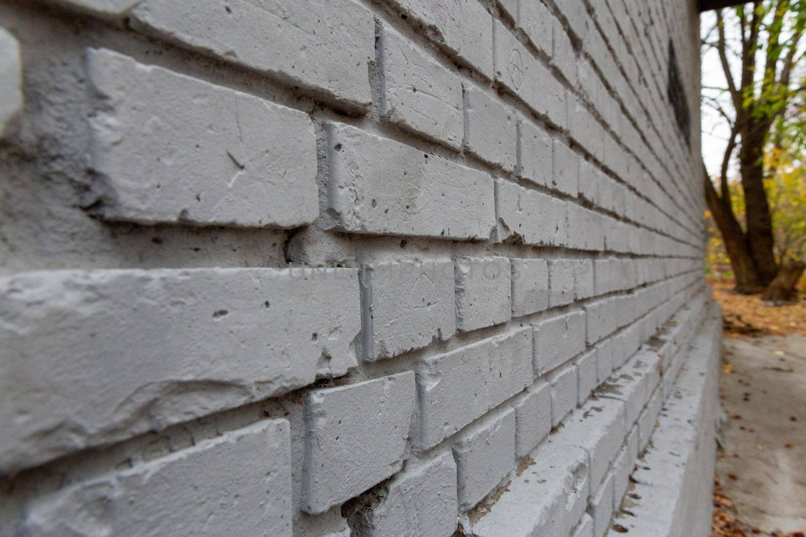 Gray brick wall. Photo background texture, close-up perspective view