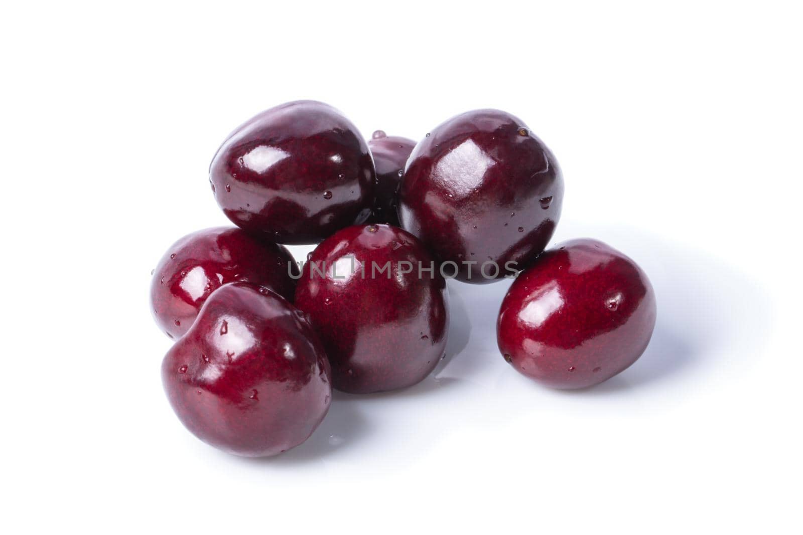 Some sweet cherry berries isolated on white background