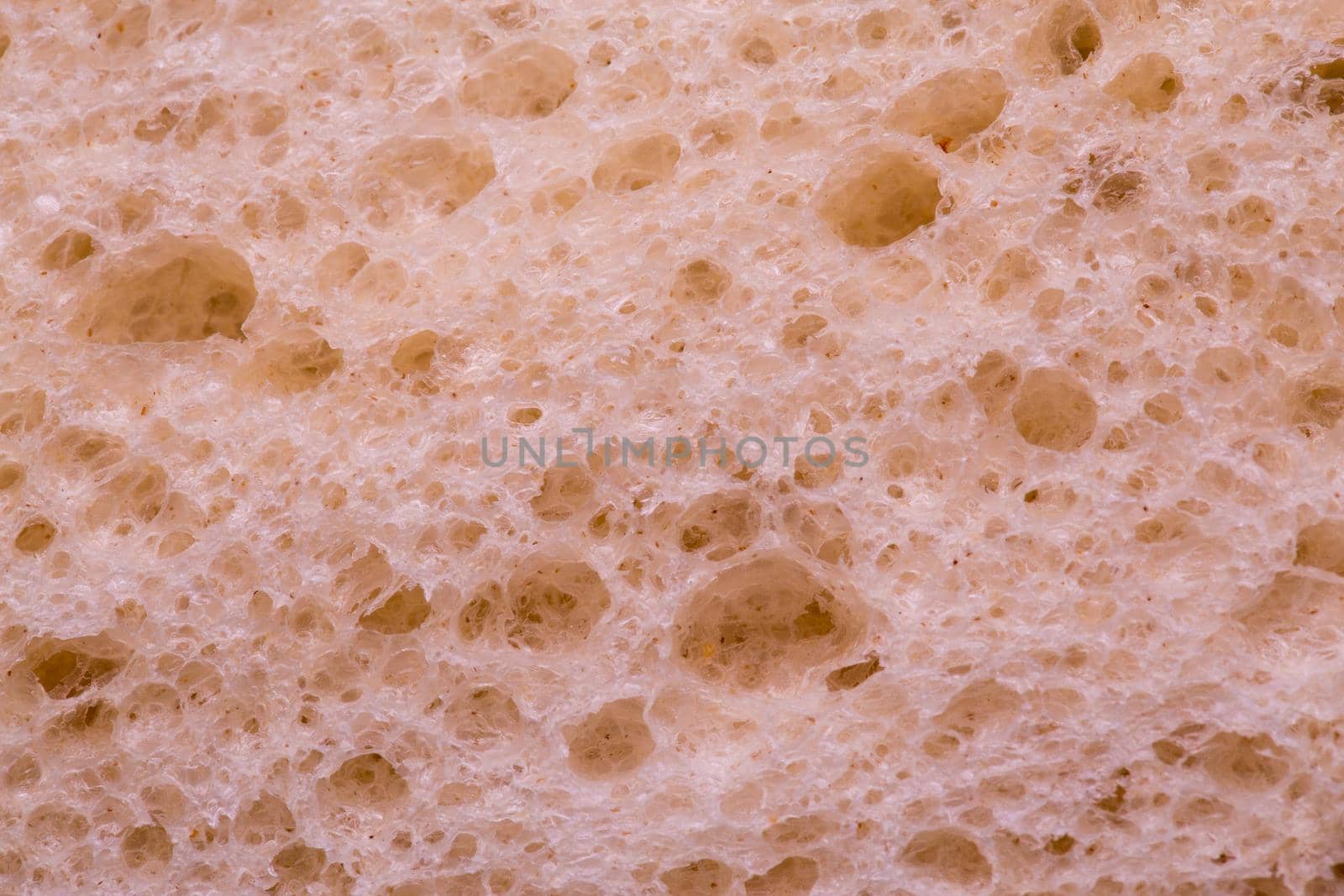 Wheaten white bread loaf texture, close-up macro shot