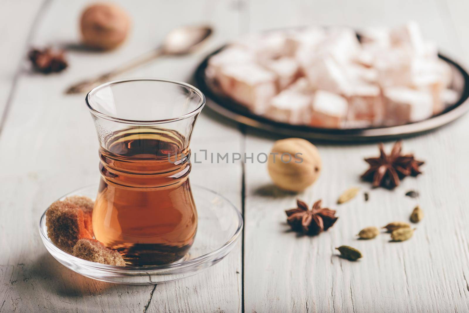 Tea with turkish delight Rahat Lokum and different spices by Seva_blsv