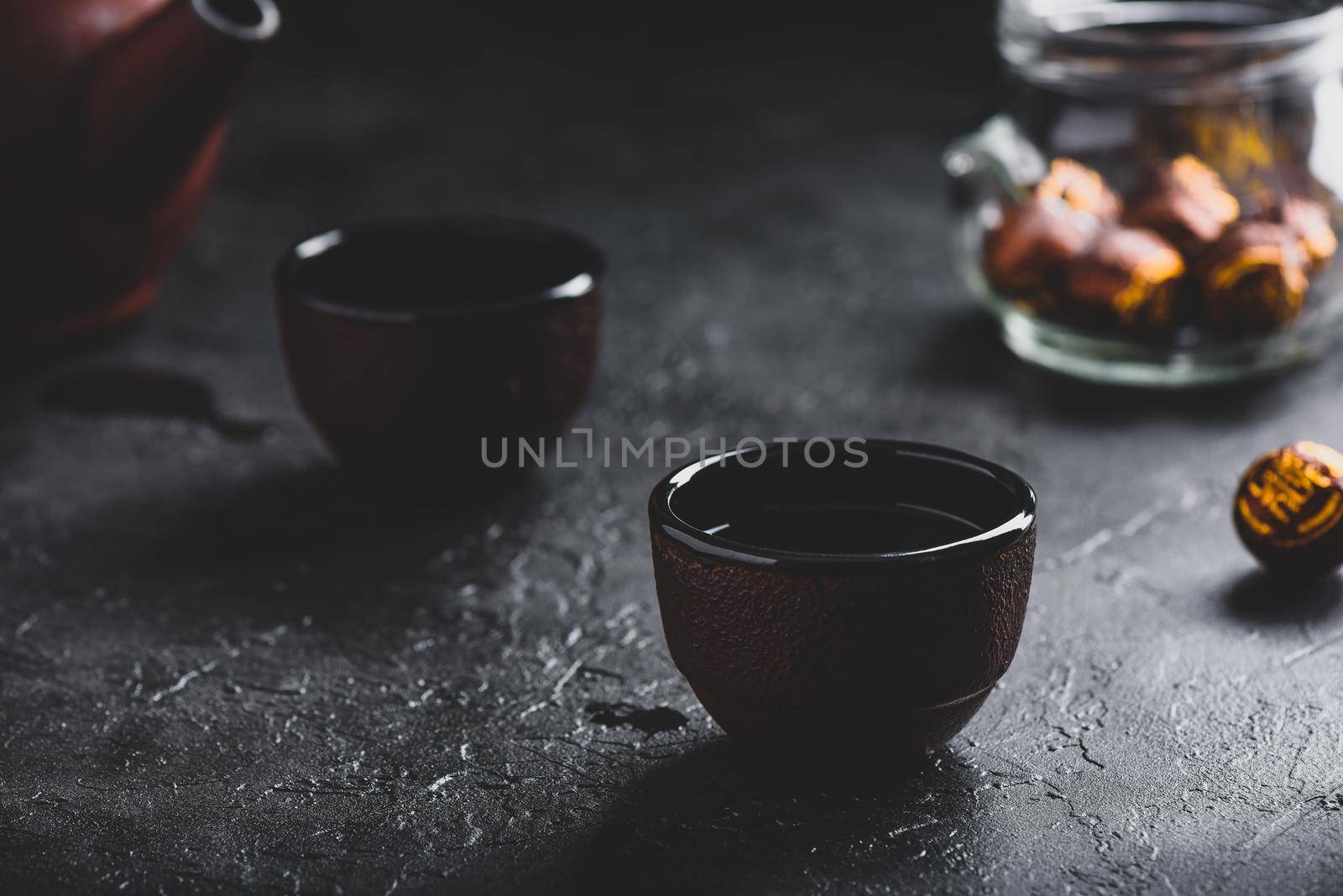 Ready red tea in two tea bowls